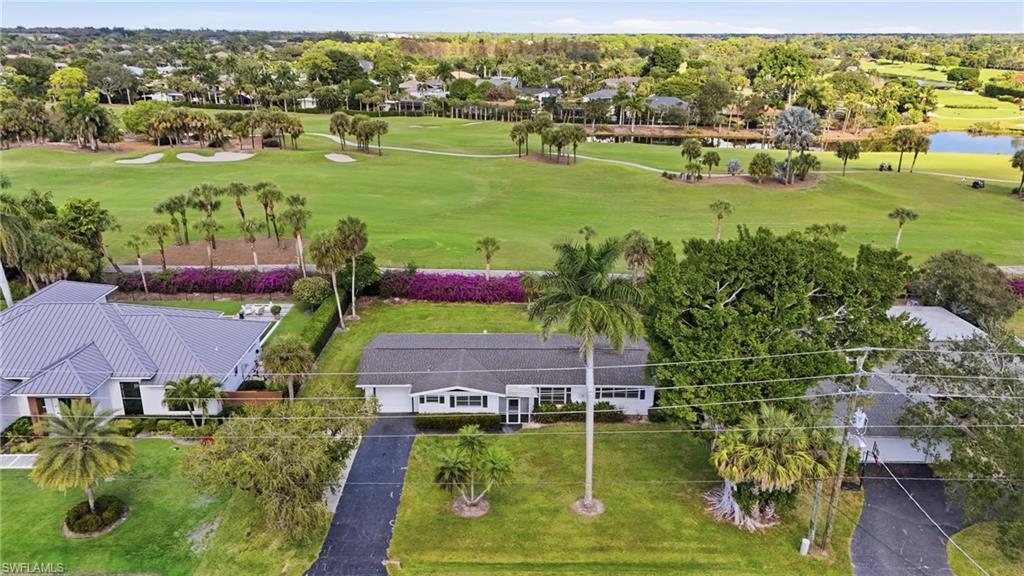 169 Viking Way Naples, FL 34110 - Photo 2 of 34 an aerial view of residential houses with outdoor space and swimming pool