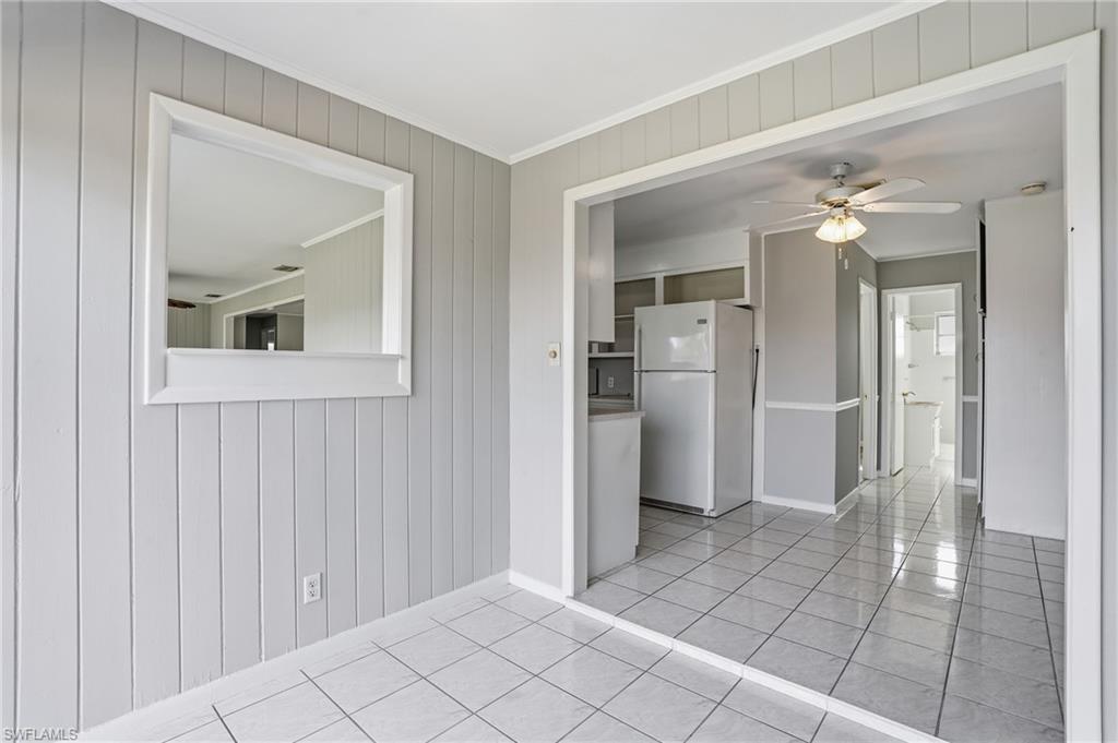 169 Viking Way Naples, FL 34110 - Photo 25 of 34 a view of a kitchen with a refrigerator and a sink