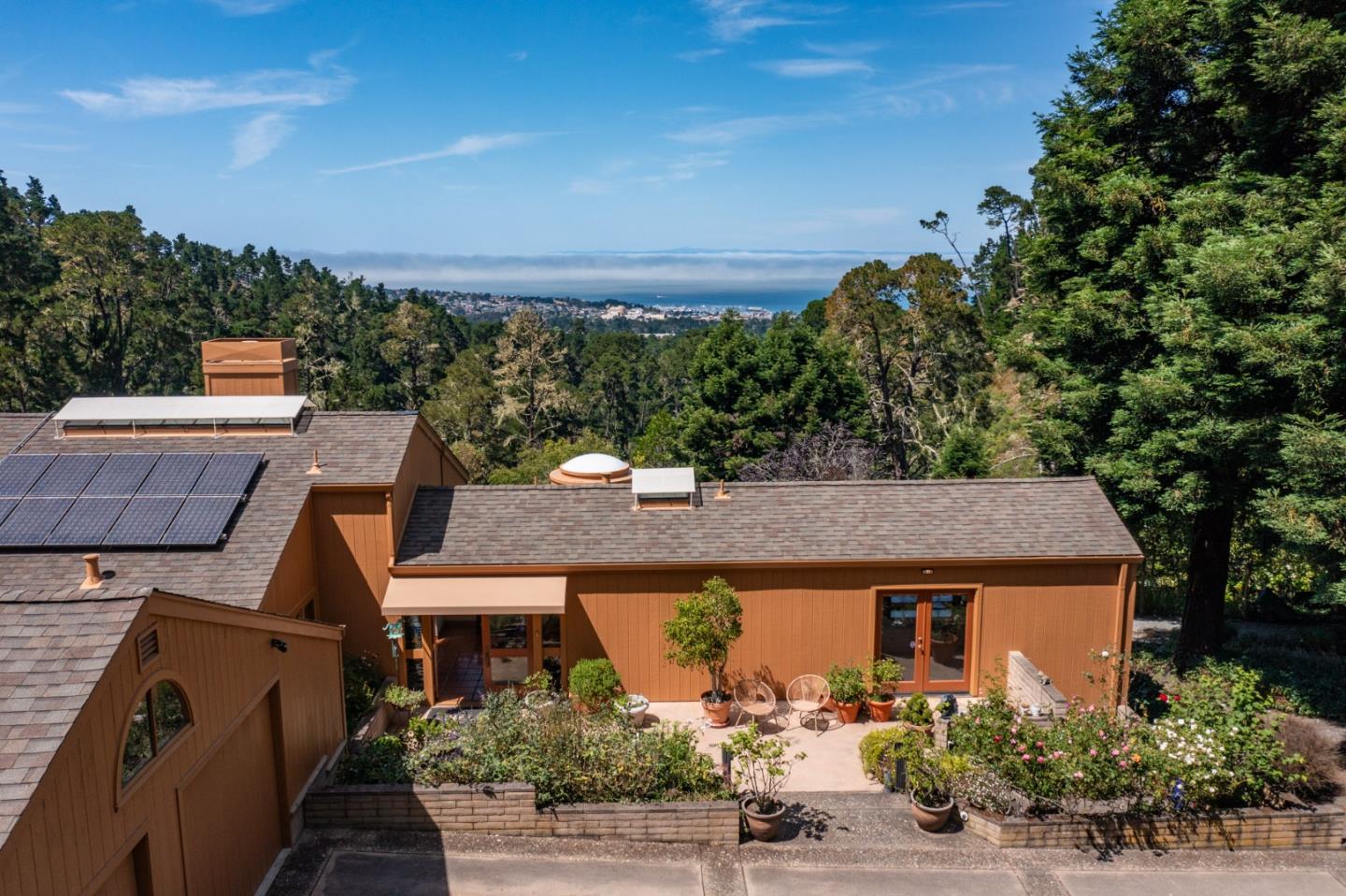 540 Aguajito Road Carmel, CA 93923 - Photo 3 of 32 an aerial view of a house with a yard
