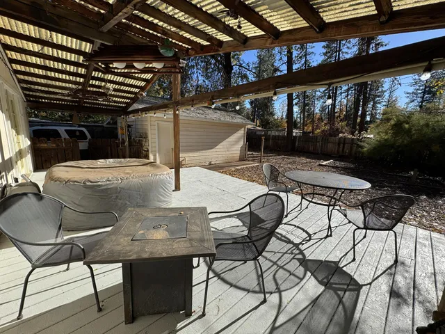 a kitchen with sink cabinets and wooden floor