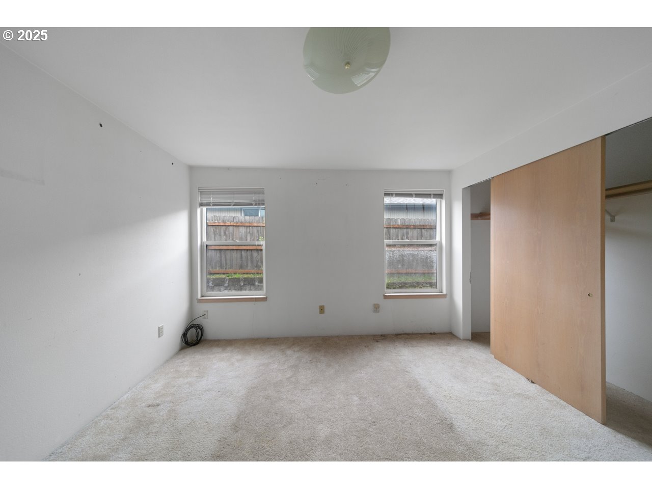 1924 Garfield Street North Bend, OR 97459 - Photo 11 of 33 a view of an empty room with a window