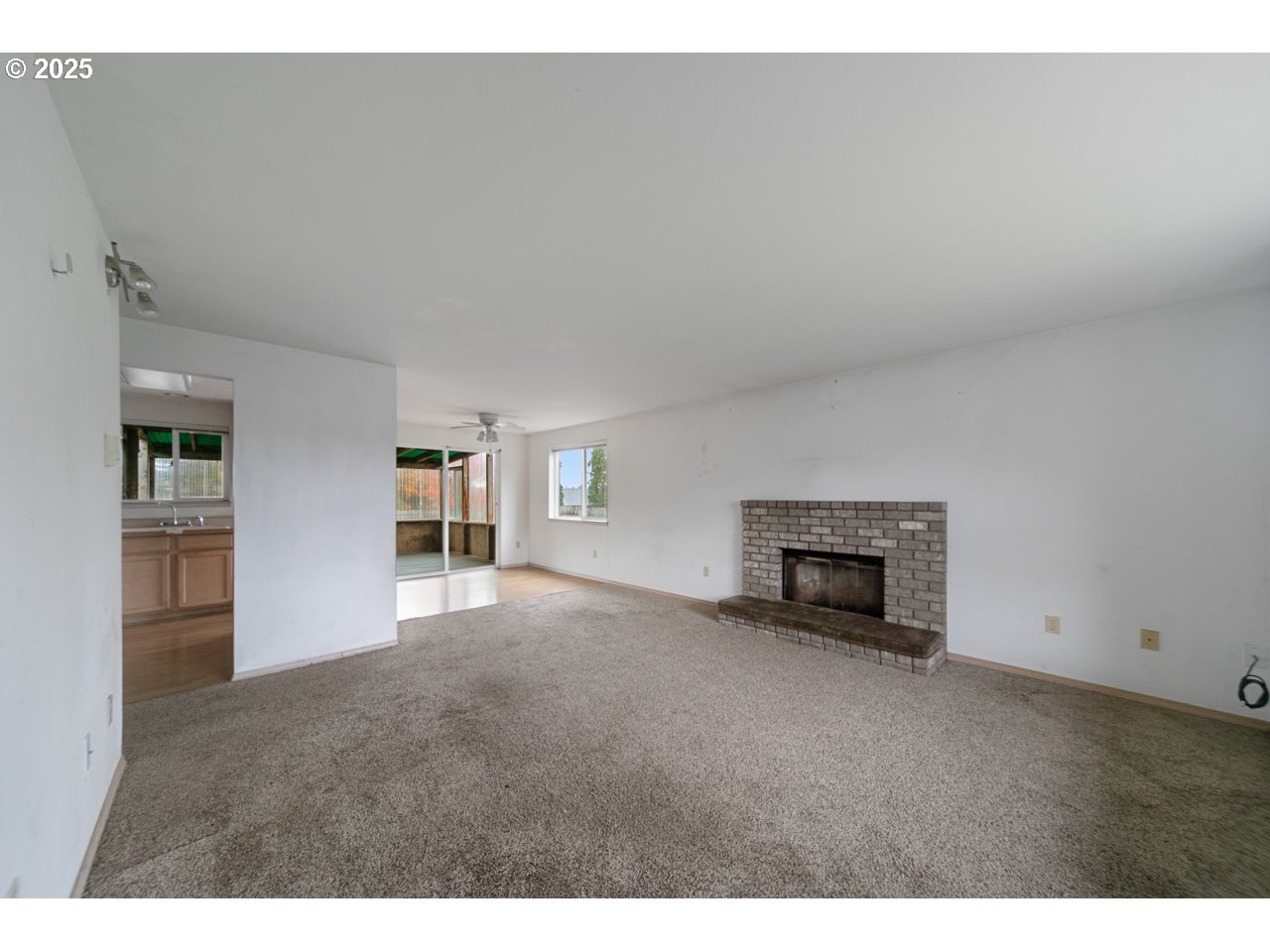 1924 Garfield Street North Bend, OR 97459 - Photo 2 of 33 a view of empty room with a fireplace