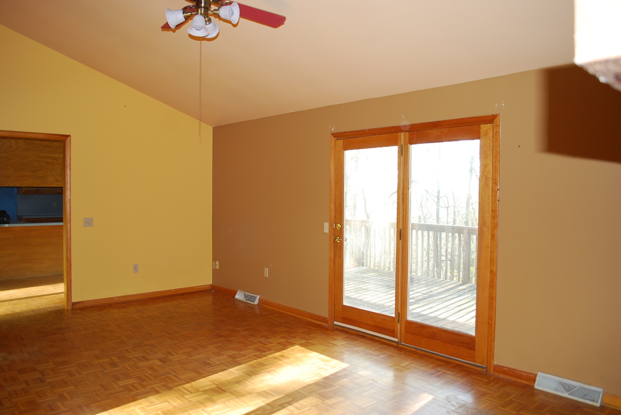 444 Iron Ridge Road Rocky Mount, VA 24151 - Photo 3 of 34 a view of an empty room with a window