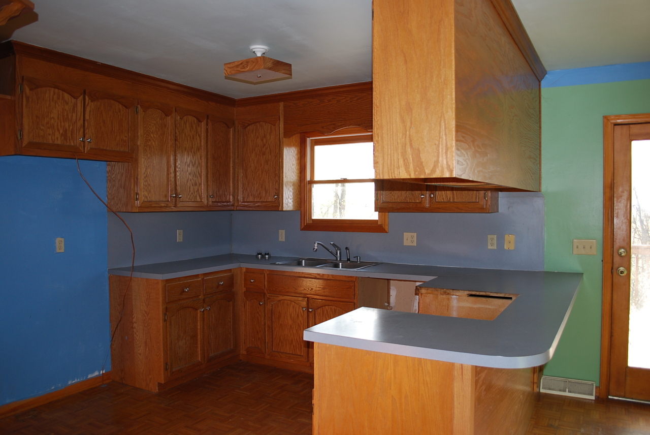 444 Iron Ridge Road Rocky Mount, VA 24151 - Photo 4 of 34 a view of a sink and dishwasher with a dining table