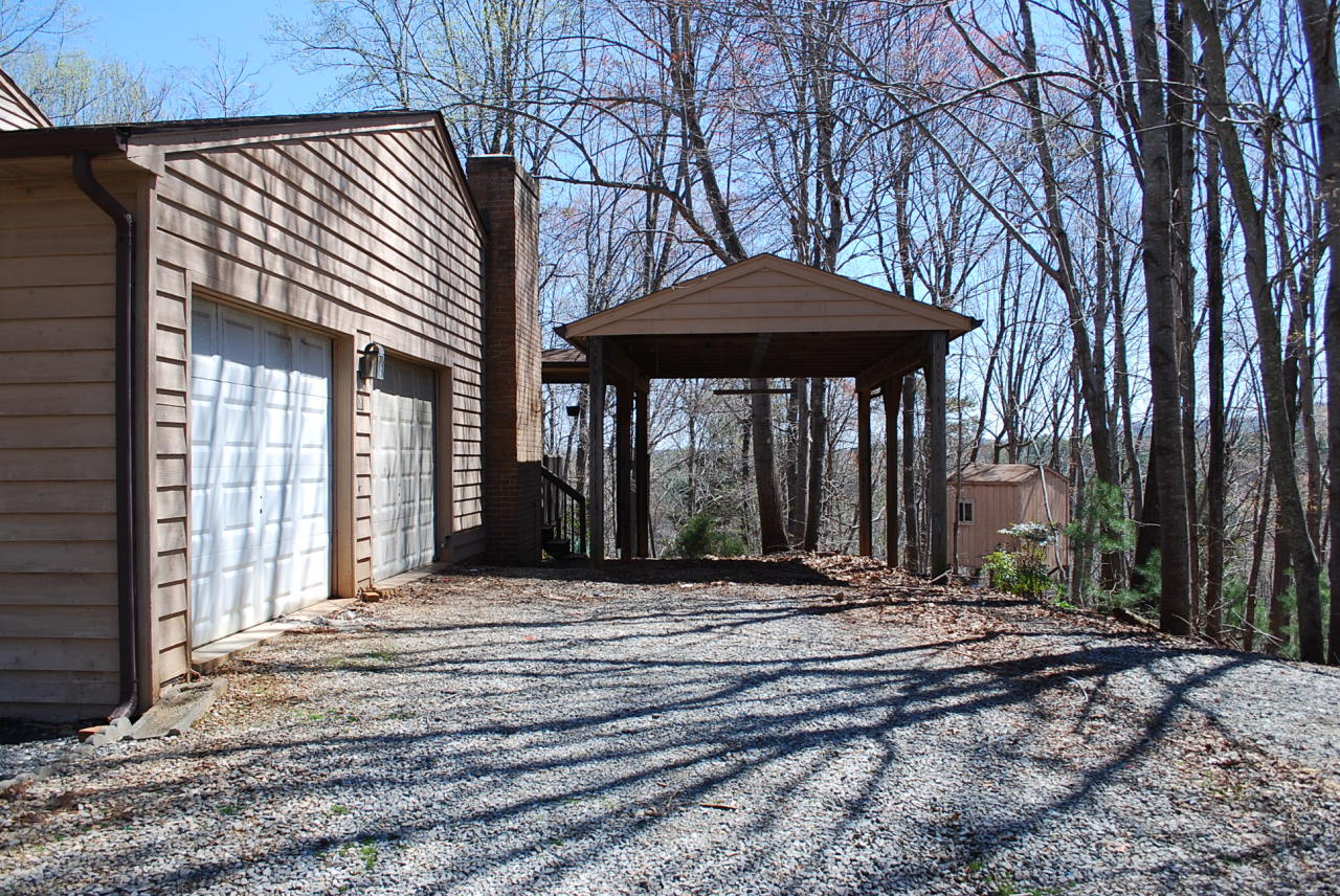 444 Iron Ridge Road Rocky Mount, VA 24151 - Photo 33 of 34 a view of a house with backyard porch and patio