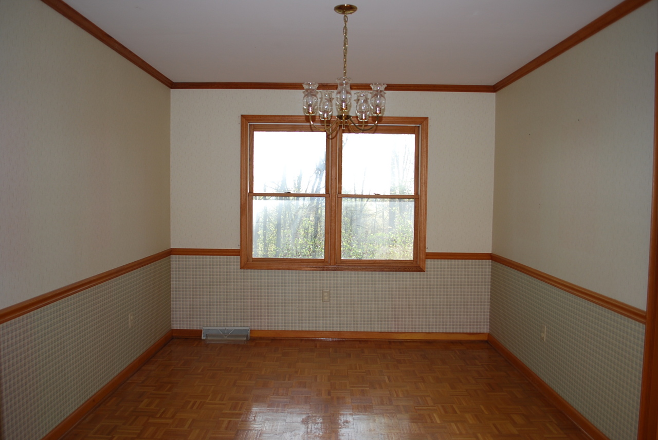 444 Iron Ridge Road Rocky Mount, VA 24151 - Photo 7 of 34 a view of an empty room with a window