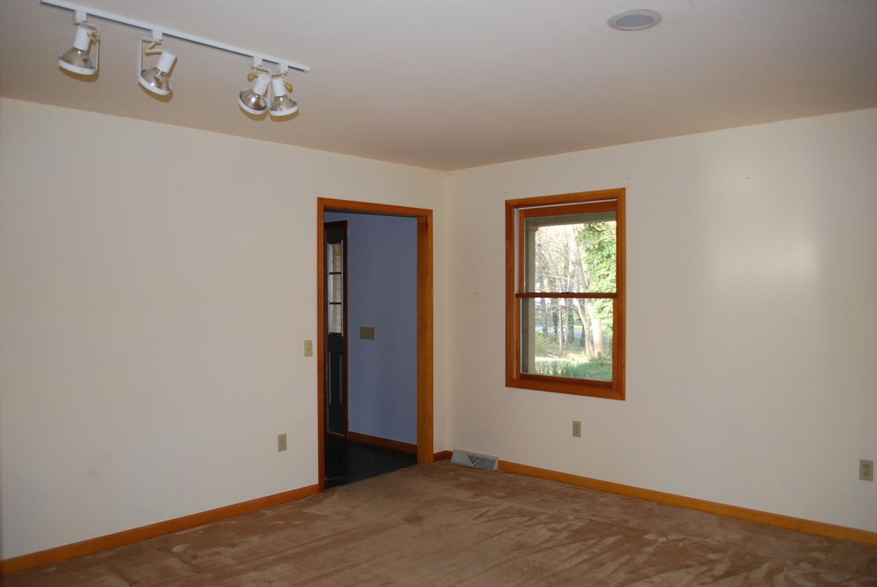 444 Iron Ridge Road Rocky Mount, VA 24151 - Photo 10 of 34 an empty room with windows and closet