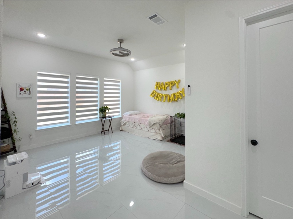 213 Camille Street Leander, TX 78641 - Photo 13 of 27 Bedroom featuring recessed lighting and vaulted ceiling