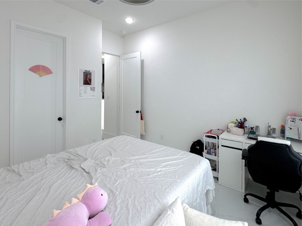 213 Camille Street Leander, TX 78641 - Photo 22 of 27 Bedroom with a desk