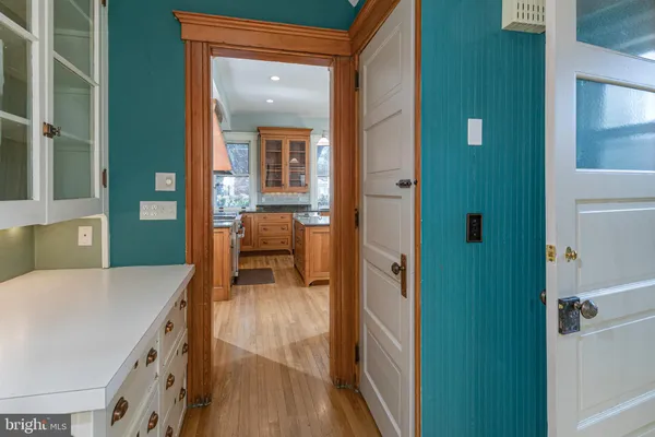 a kitchen with stainless steel appliances granite countertop a refrigerator a sink and a stove