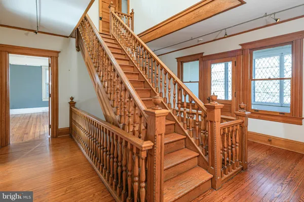 a view of entryway with wooden floor