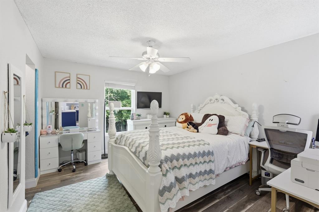 767 East Barry Street Azle, TX 76020 - Photo 26 of 40 This room features light-colored walls and a window providing natural light