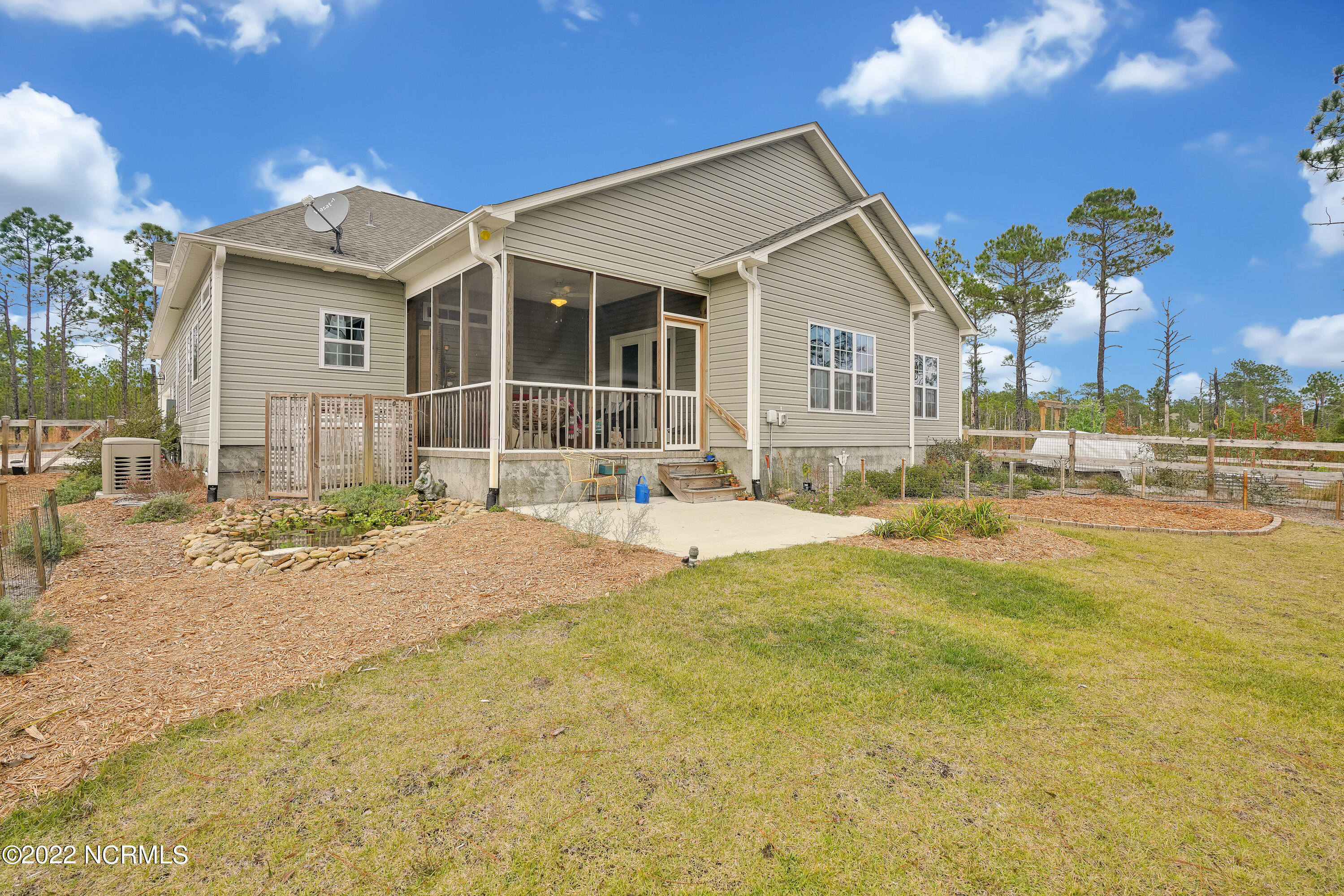1663 Pinnacle Parkway Hampstead, NC 28443 - Photo 29 of 53 Back of home
