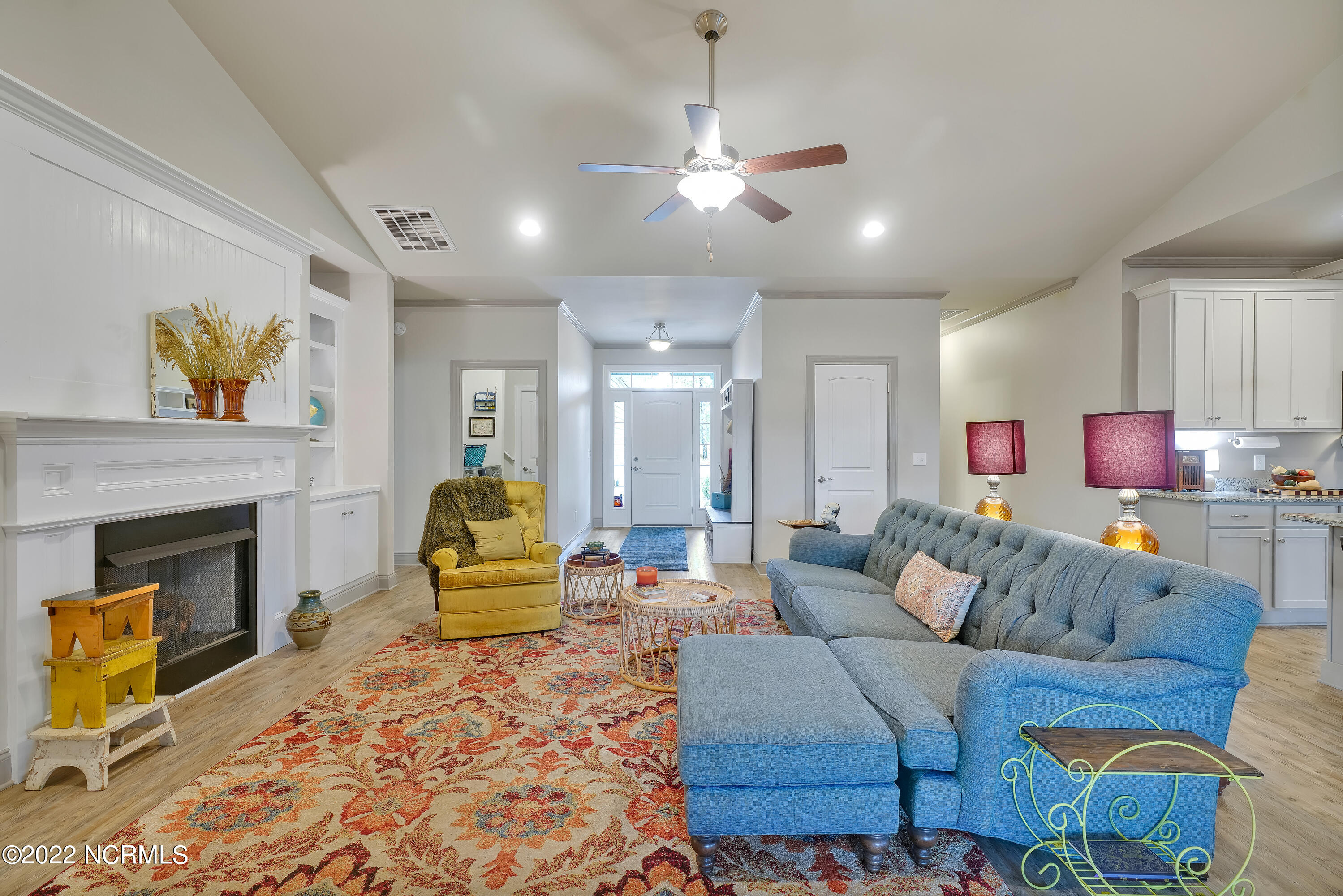 1663 Pinnacle Parkway Hampstead, NC 28443 - Photo 9 of 53 living room and kitchen area