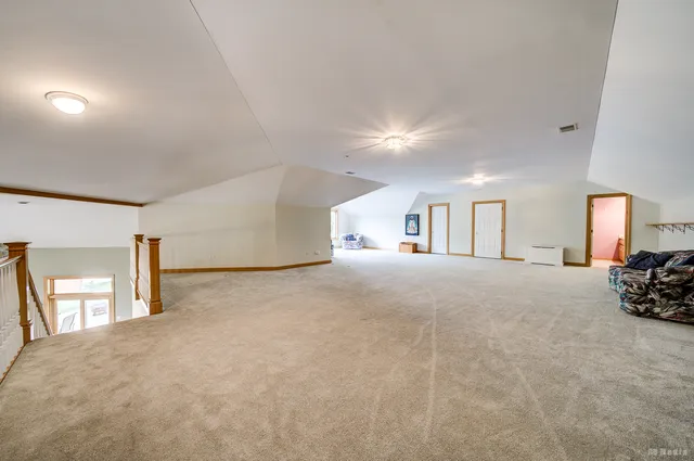 a aerial view of a house with swimming pool garden view and a yard