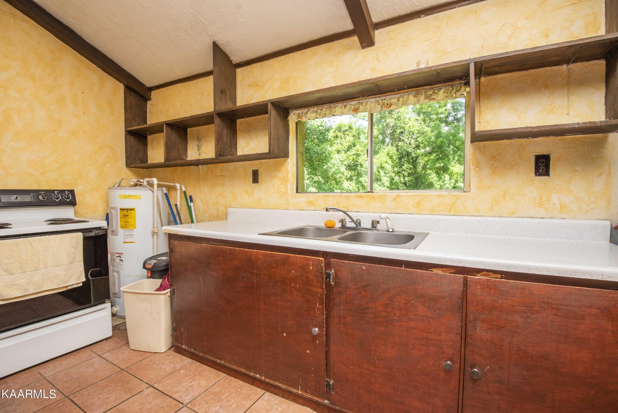 1104 Blockhouse Valley Road Clinton, TN 37716 - Photo 11 of 56 a bathroom with a sink and mirror
