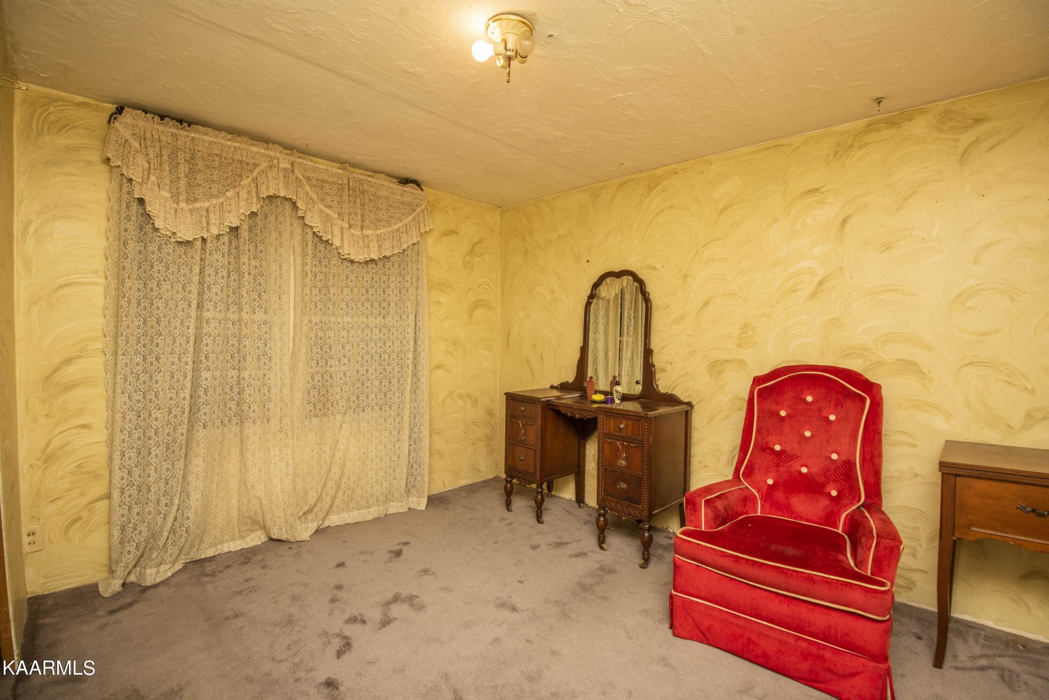 1104 Blockhouse Valley Road Clinton, TN 37716 - Photo 25 of 56 a living room with couch chairs and a chandelier