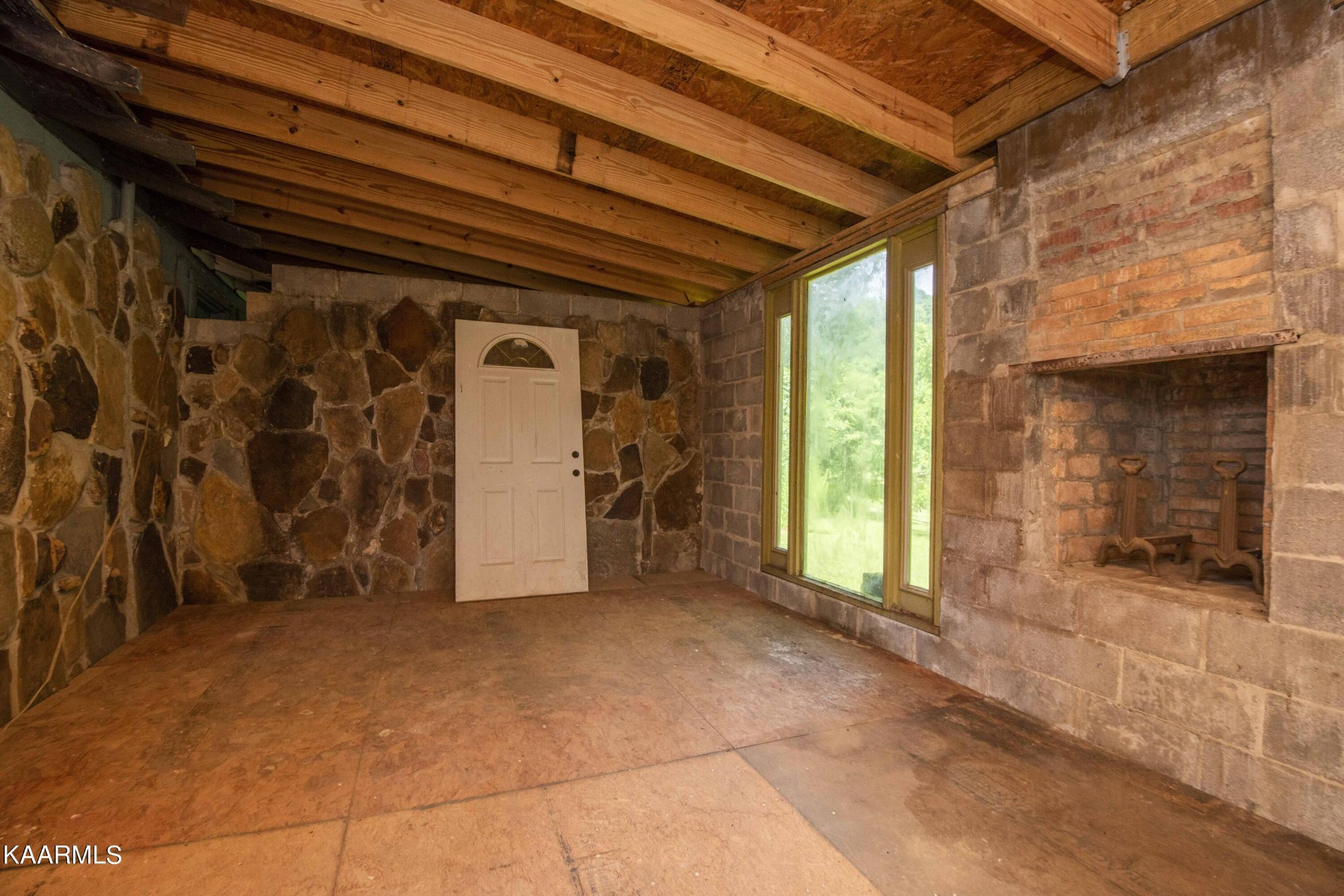 1104 Blockhouse Valley Road Clinton, TN 37716 - Photo 28 of 56 a view of a porch with furniture and a gate