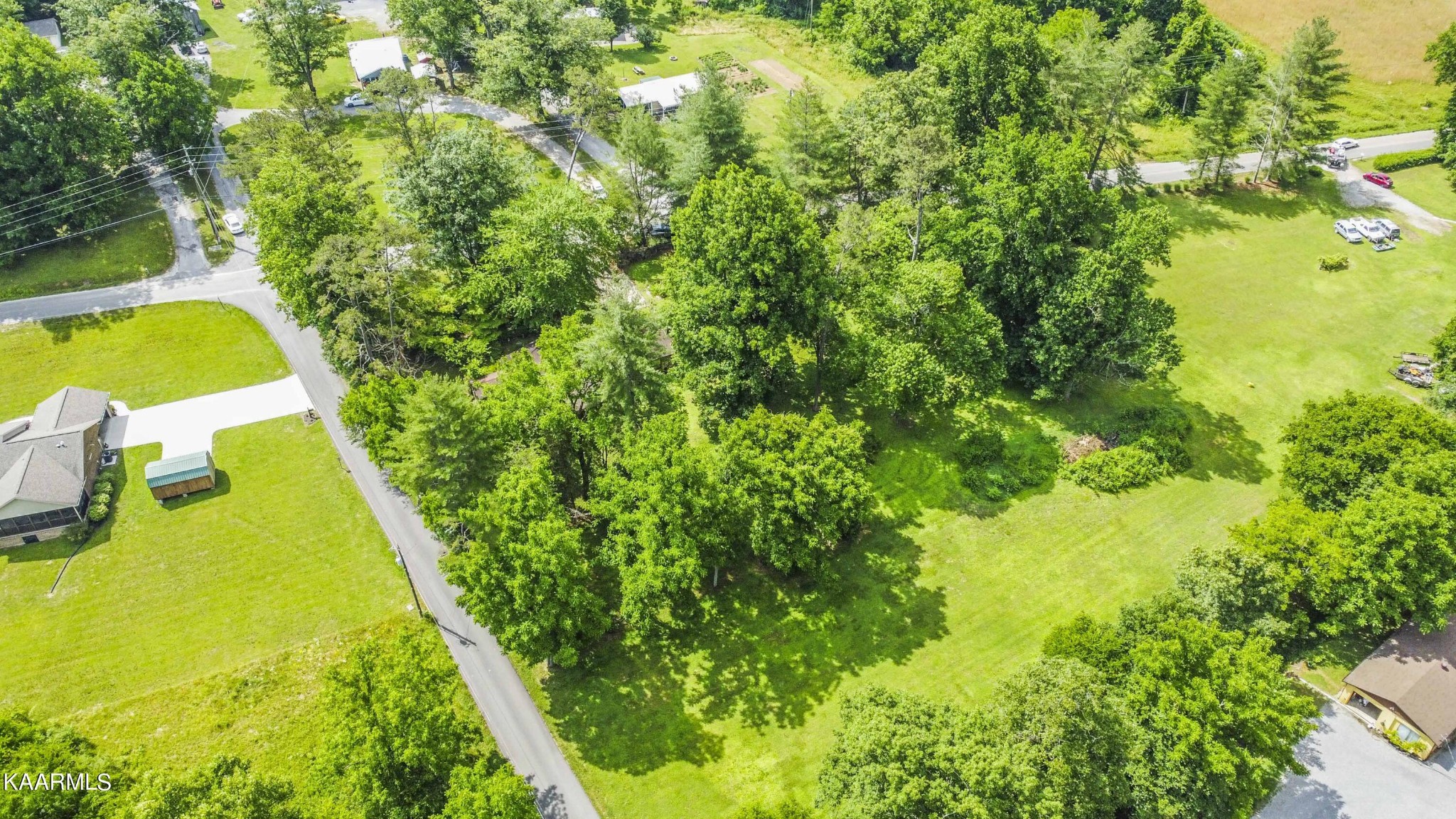1104 Blockhouse Valley Road Clinton, TN 37716 - Photo 37 of 56 a view of a swimming pool with a yard
