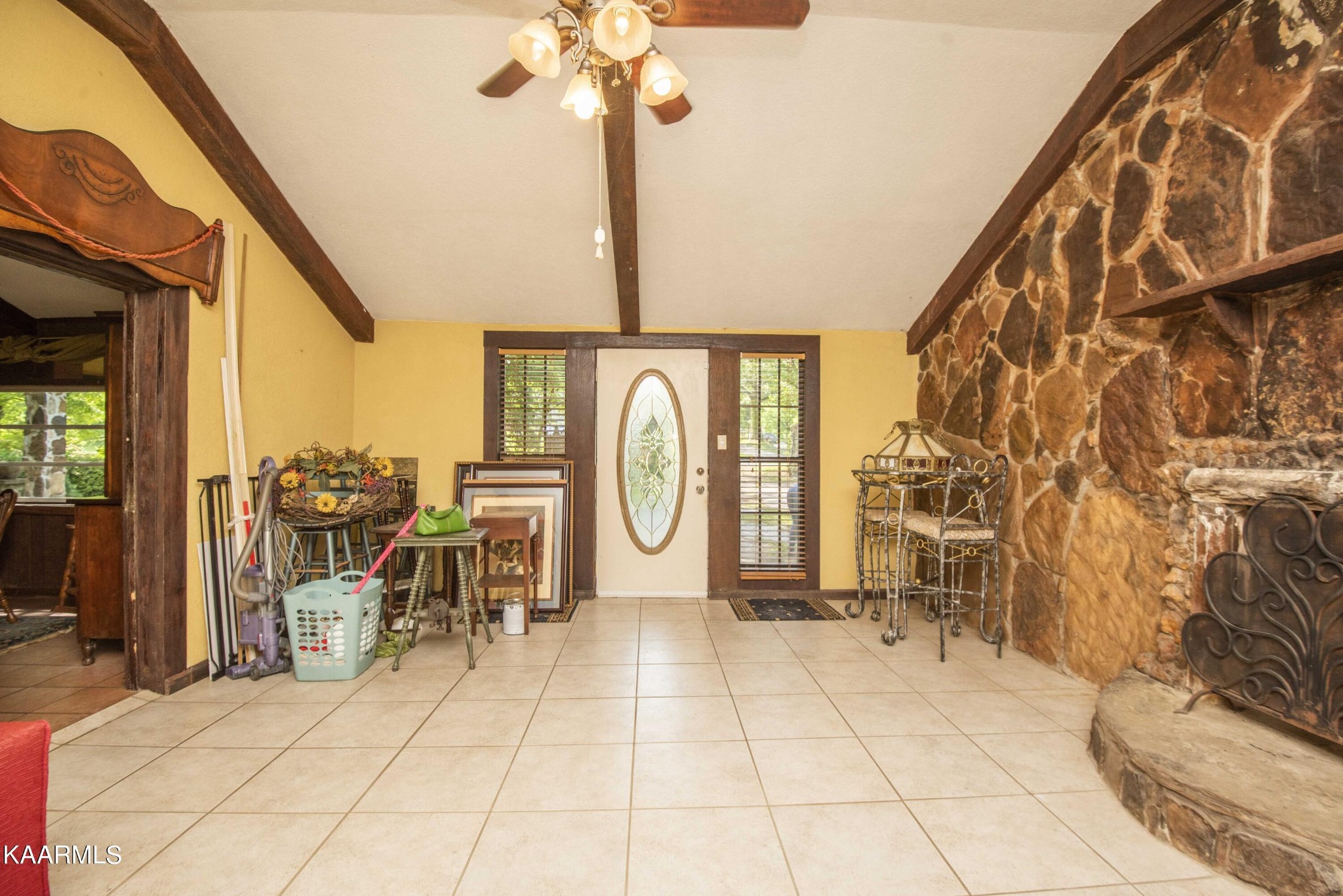 1104 Blockhouse Valley Road Clinton, TN 37716 - Photo 4 of 56 a very nice looking room with a large window and chandelier