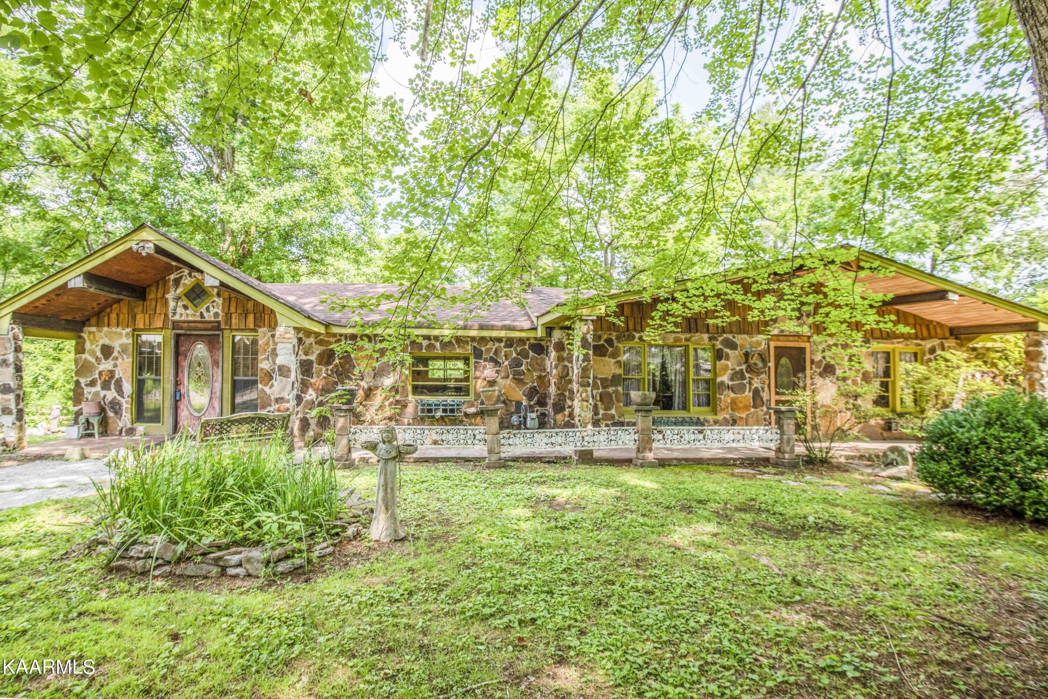 1104 Blockhouse Valley Road Clinton, TN 37716 - Photo 44 of 56 a view of a yard in front of house