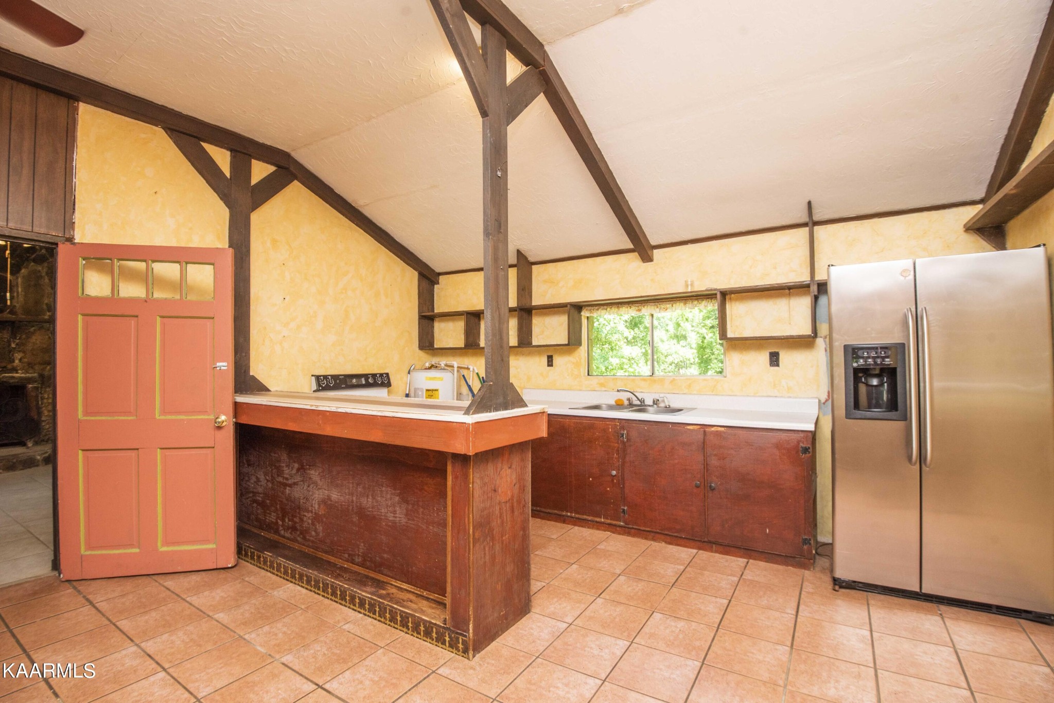 1104 Blockhouse Valley Road Clinton, TN 37716 - Photo 10 of 56 a kitchen with stainless steel appliances granite countertop a refrigerator and a sink