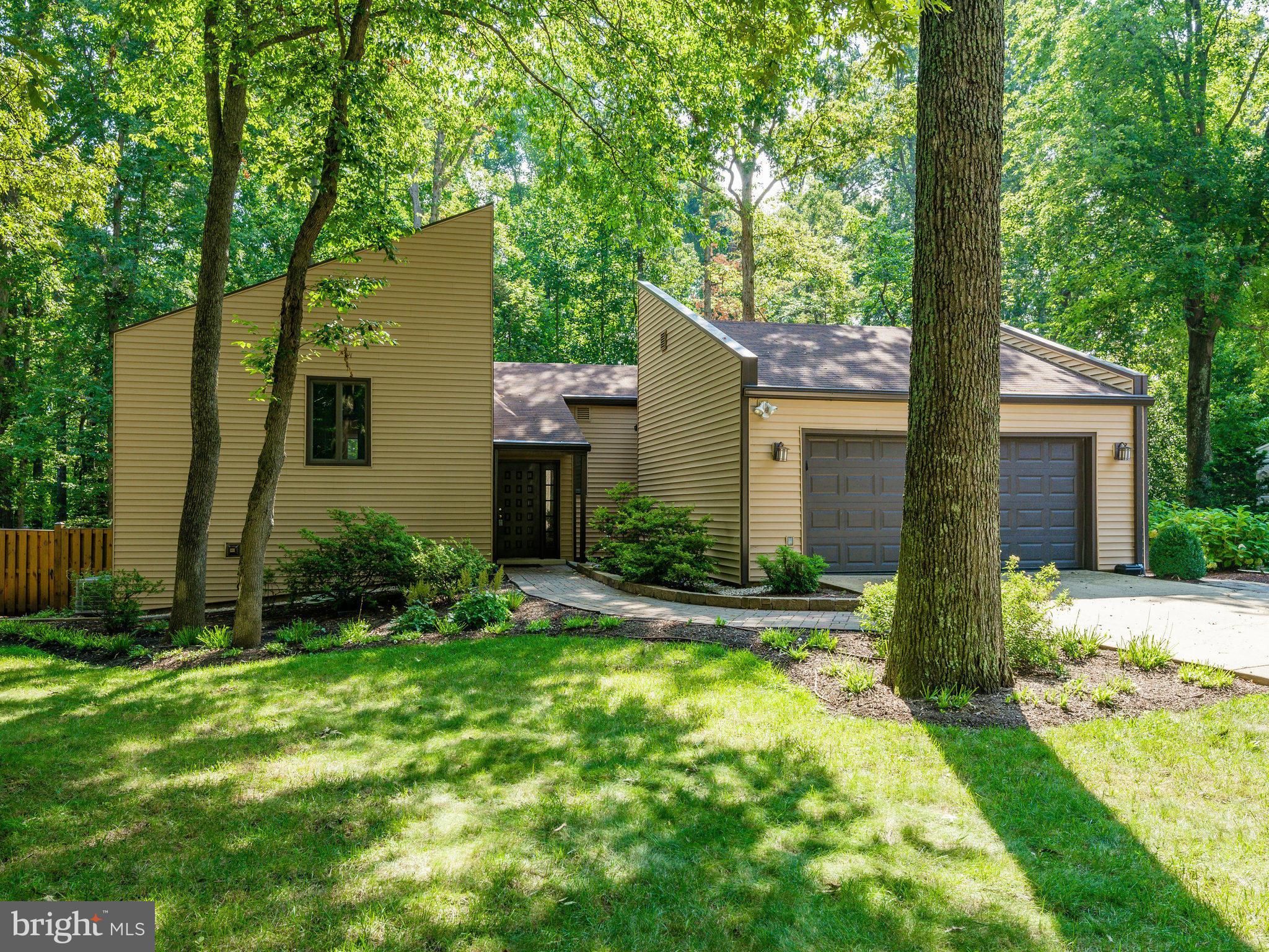 2437 Freetown Drive Reston, VA 20191 - Photo 1 of 30 front view of a house with a yard