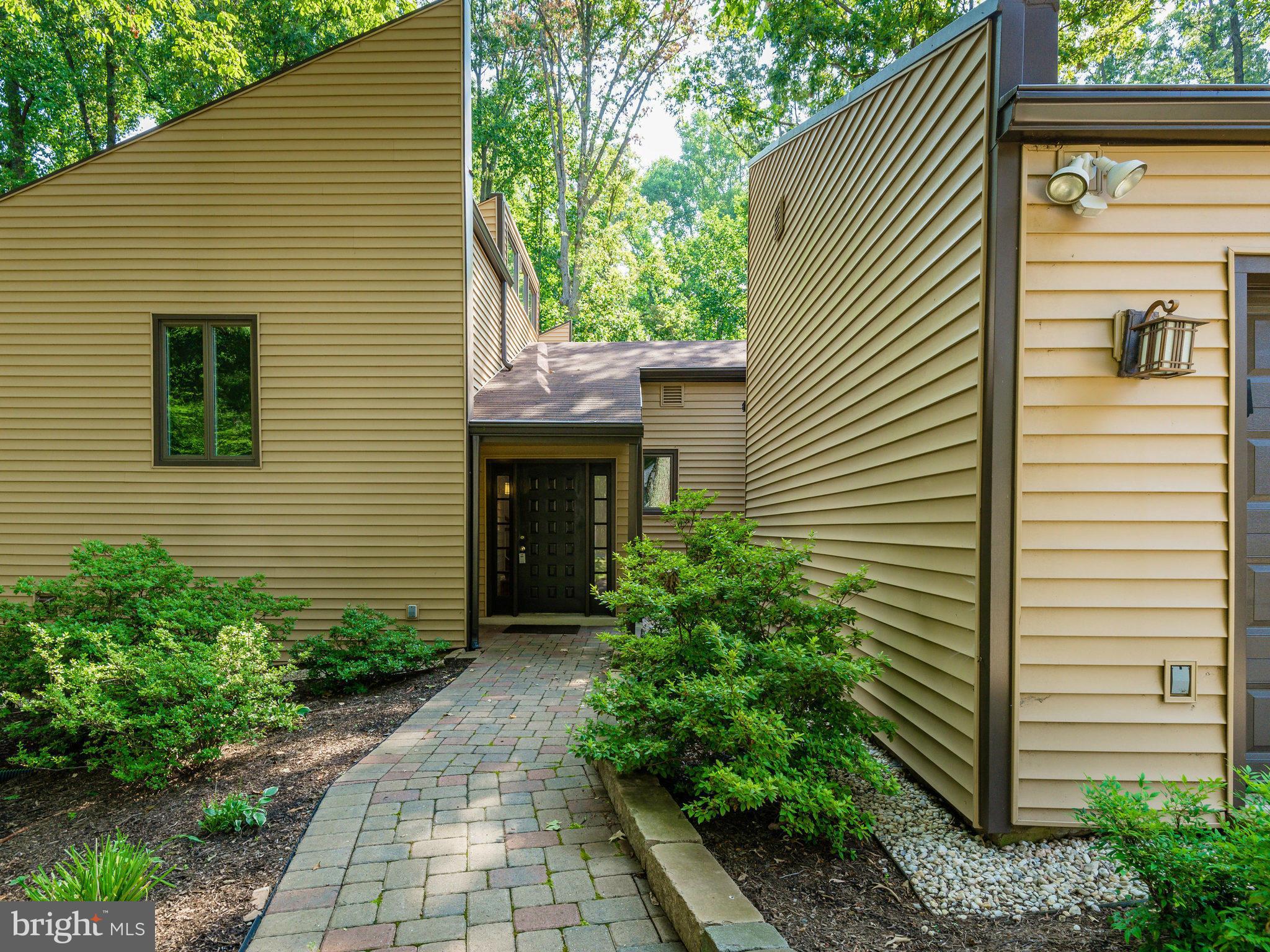 2437 Freetown Drive Reston, VA 20191 - Photo 2 of 30 a view of house with backyard and sitting area