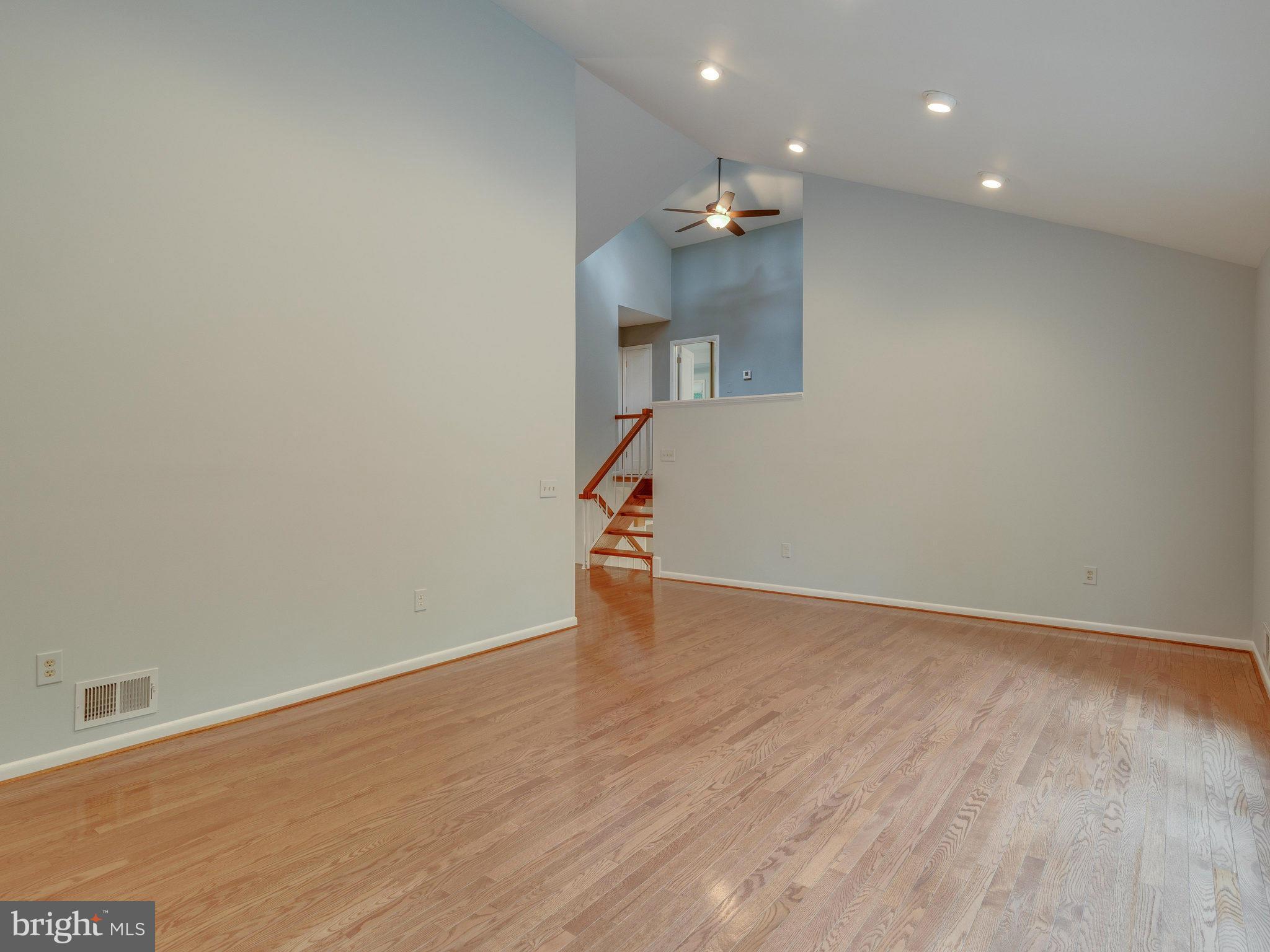 2437 Freetown Drive Reston, VA 20191 - Photo 11 of 30 a view of empty room with wooden floor