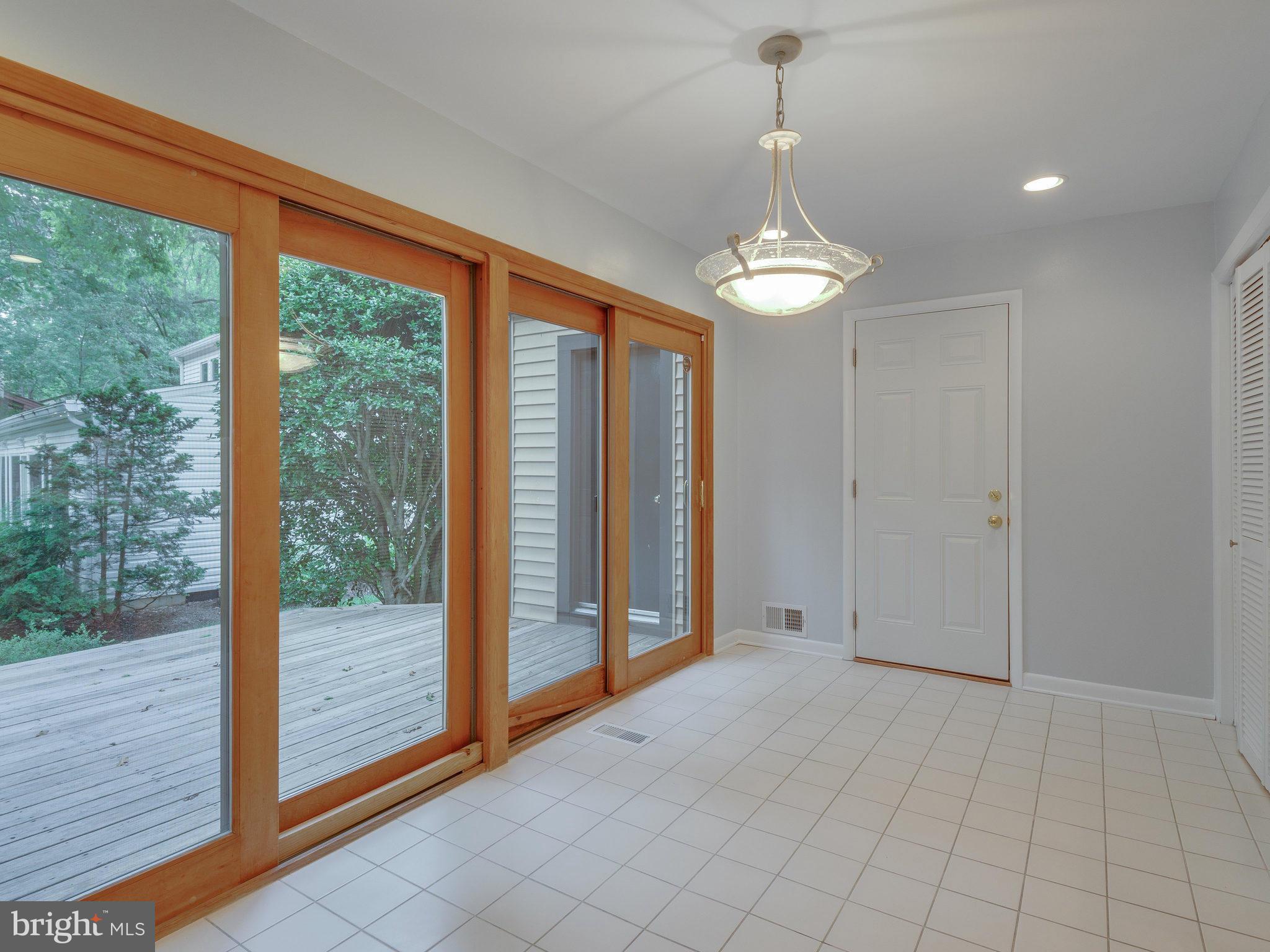 2437 Freetown Drive Reston, VA 20191 - Photo 19 of 30 a view of an empty room with glass door