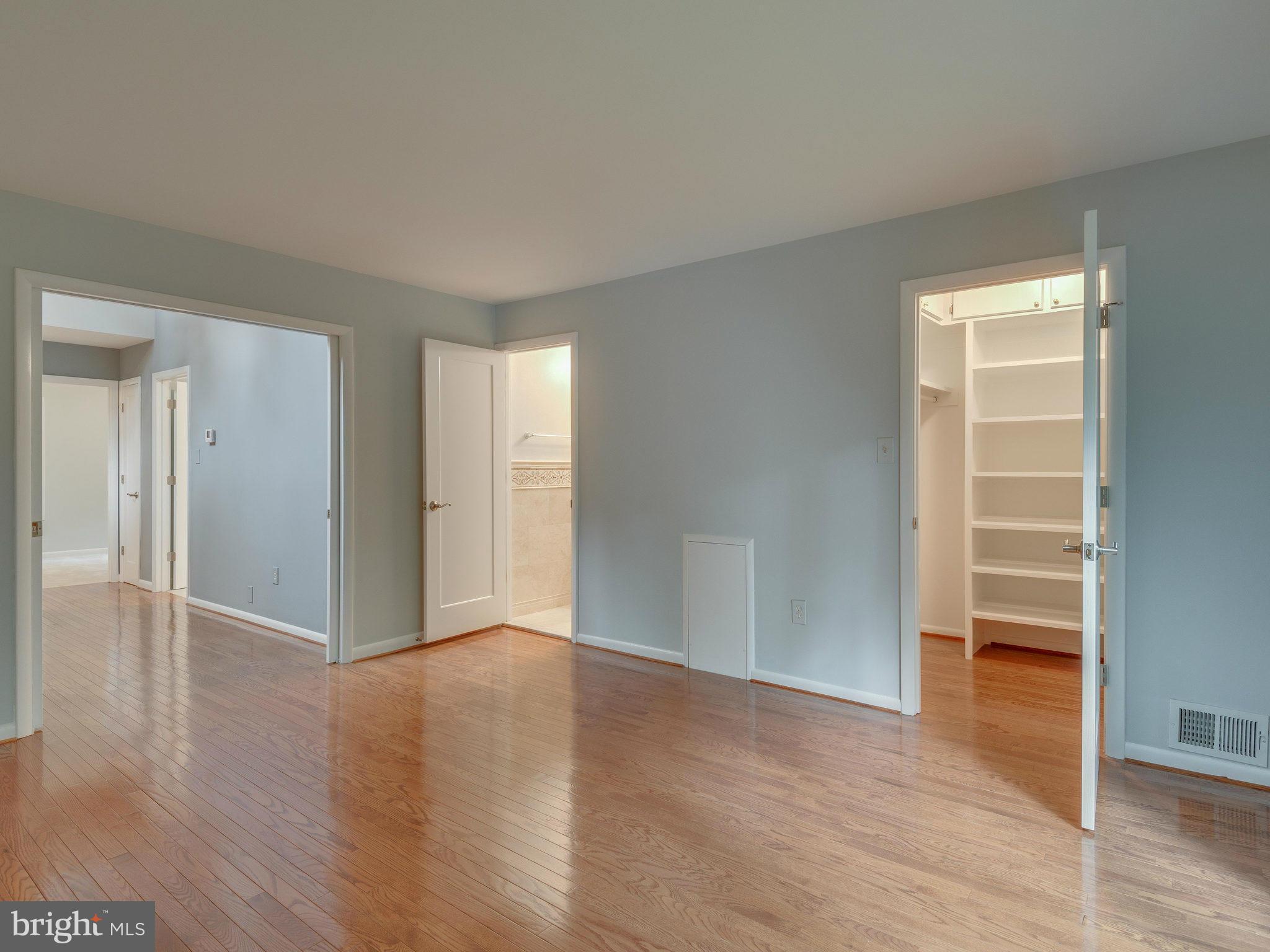 2437 Freetown Drive Reston, VA 20191 - Photo 22 of 30 a view of an empty room with wooden floor & window