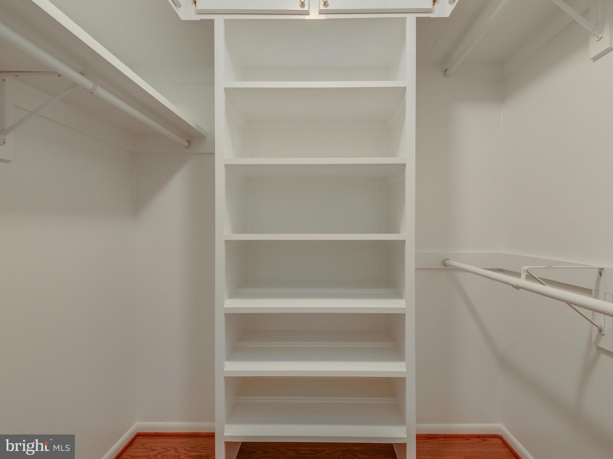 2437 Freetown Drive Reston, VA 20191 - Photo 23 of 30 a view of walk in closet with empty racks