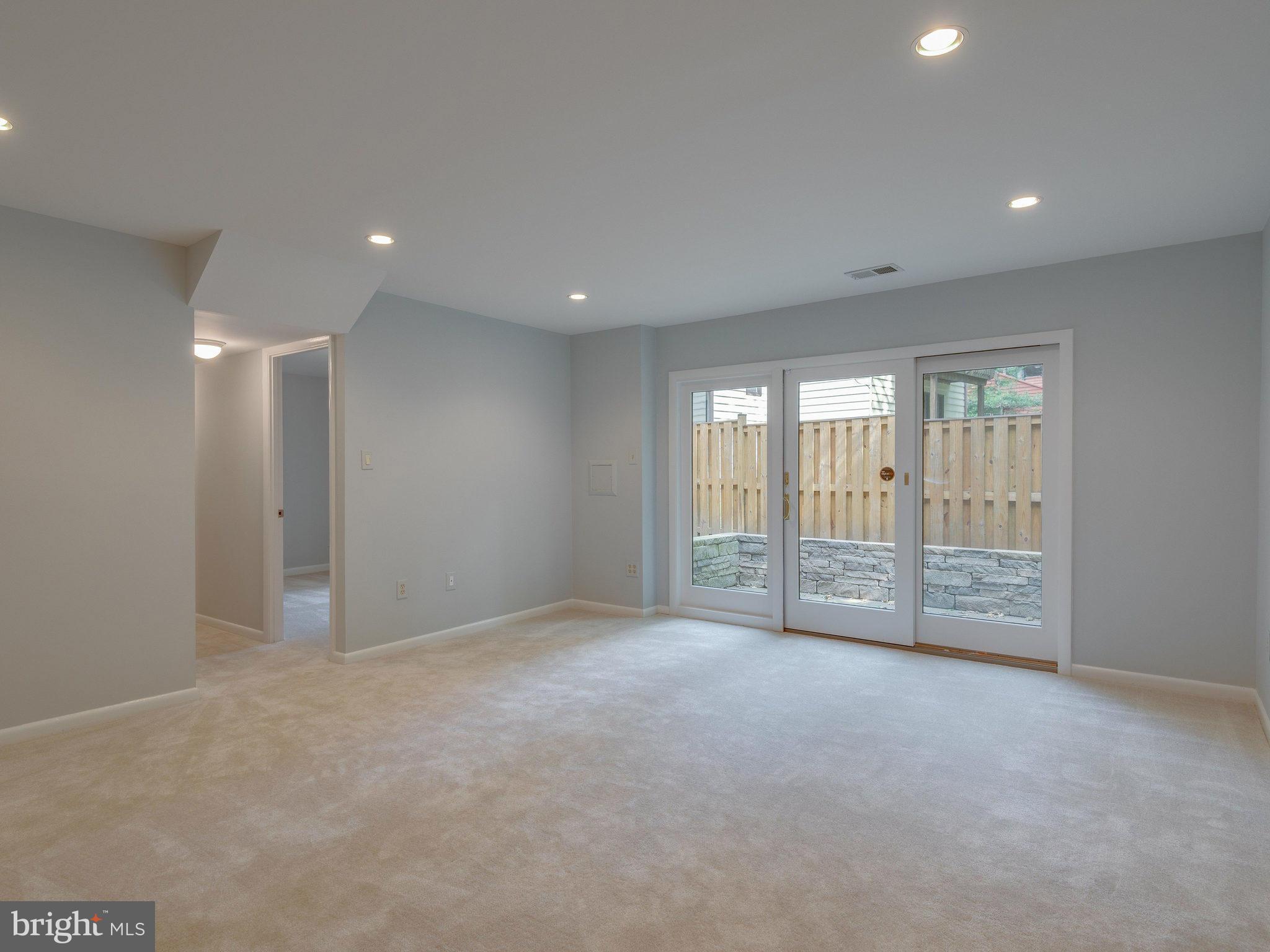 2437 Freetown Drive Reston, VA 20191 - Photo 27 of 30 a view of an empty room with glass door