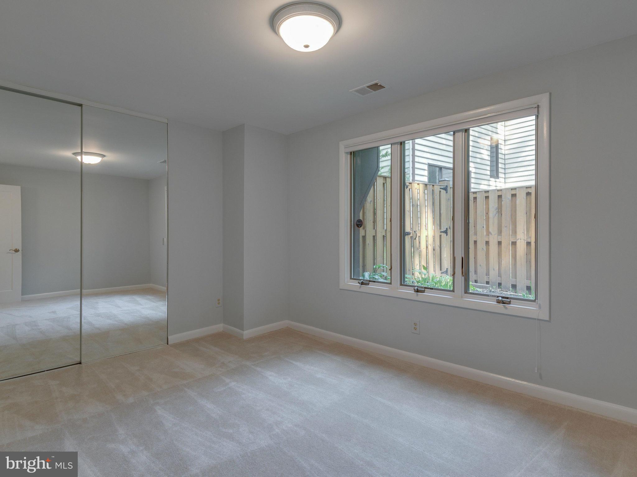 2437 Freetown Drive Reston, VA 20191 - Photo 29 of 30 a view of an empty room with a window