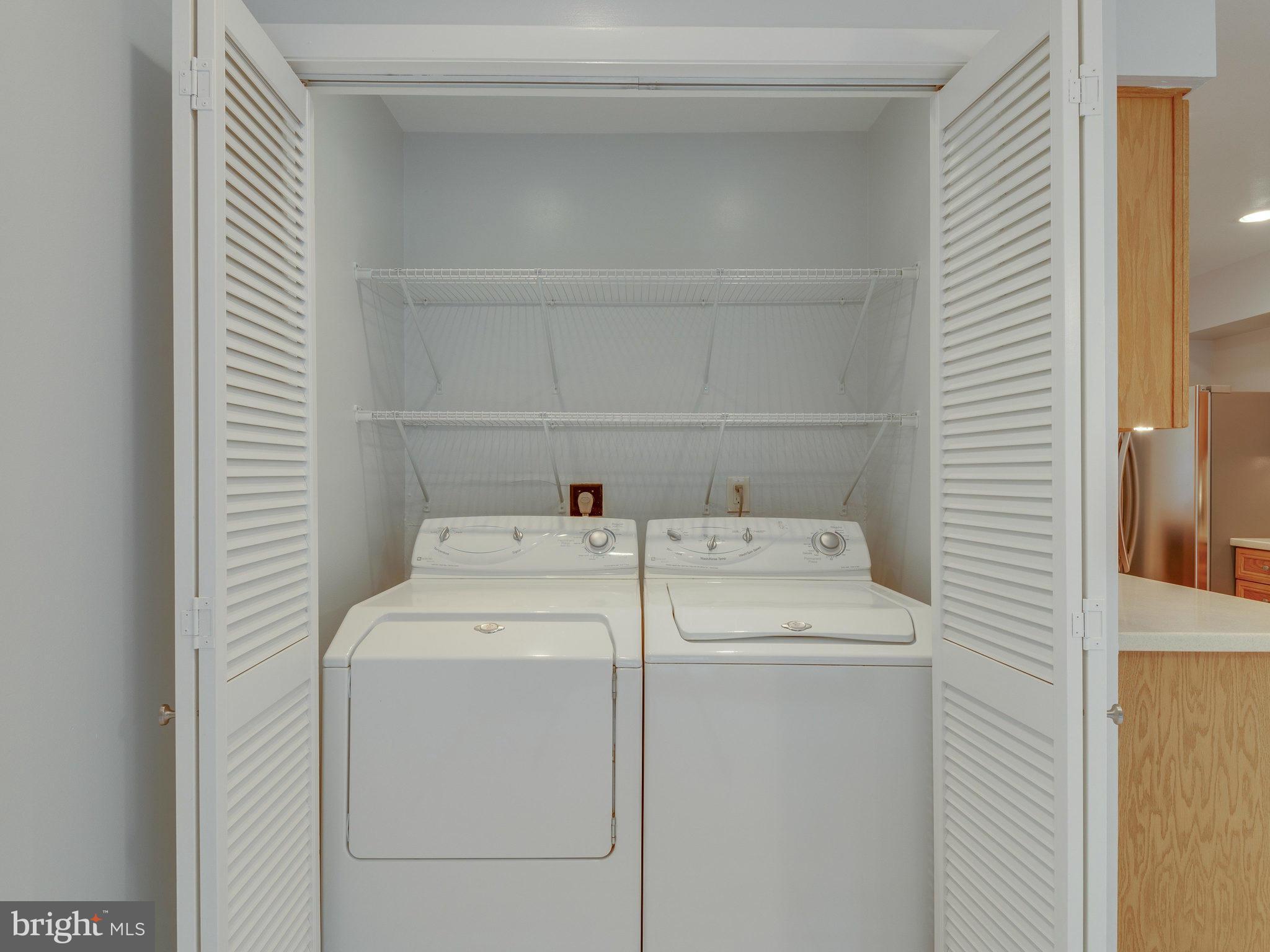 2437 Freetown Drive Reston, VA 20191 - Photo 30 of 30 a utility room with dryer and washer