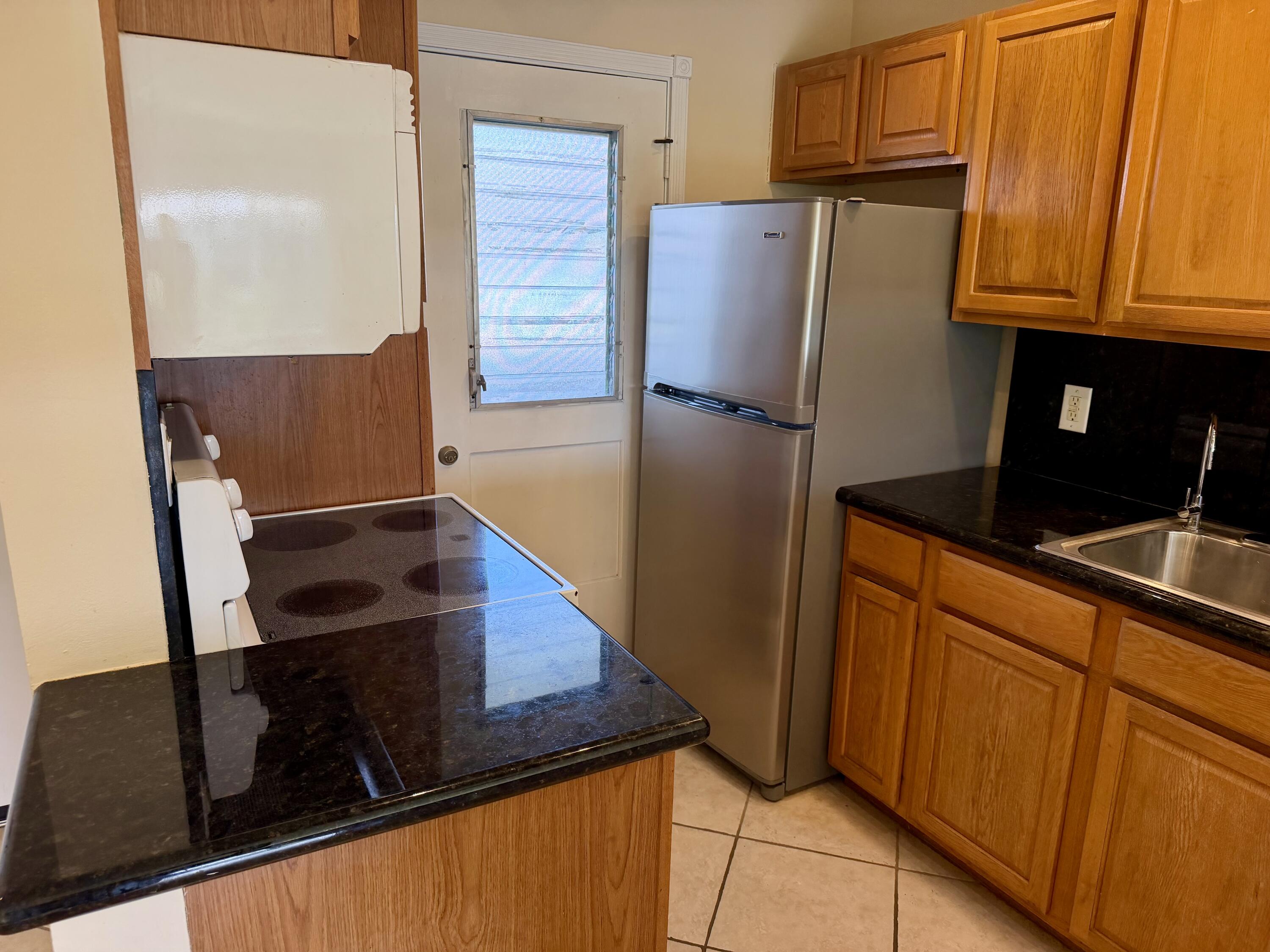 5601 Northwest 2nd Avenue, Unit 326 Boca Raton, FL 33487 - Photo 3 of 12 Kitchen 2
