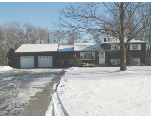135 Baldwin Road Billerica, MA 01821 - Photo 1 of 1 a front view of a house with a yard
