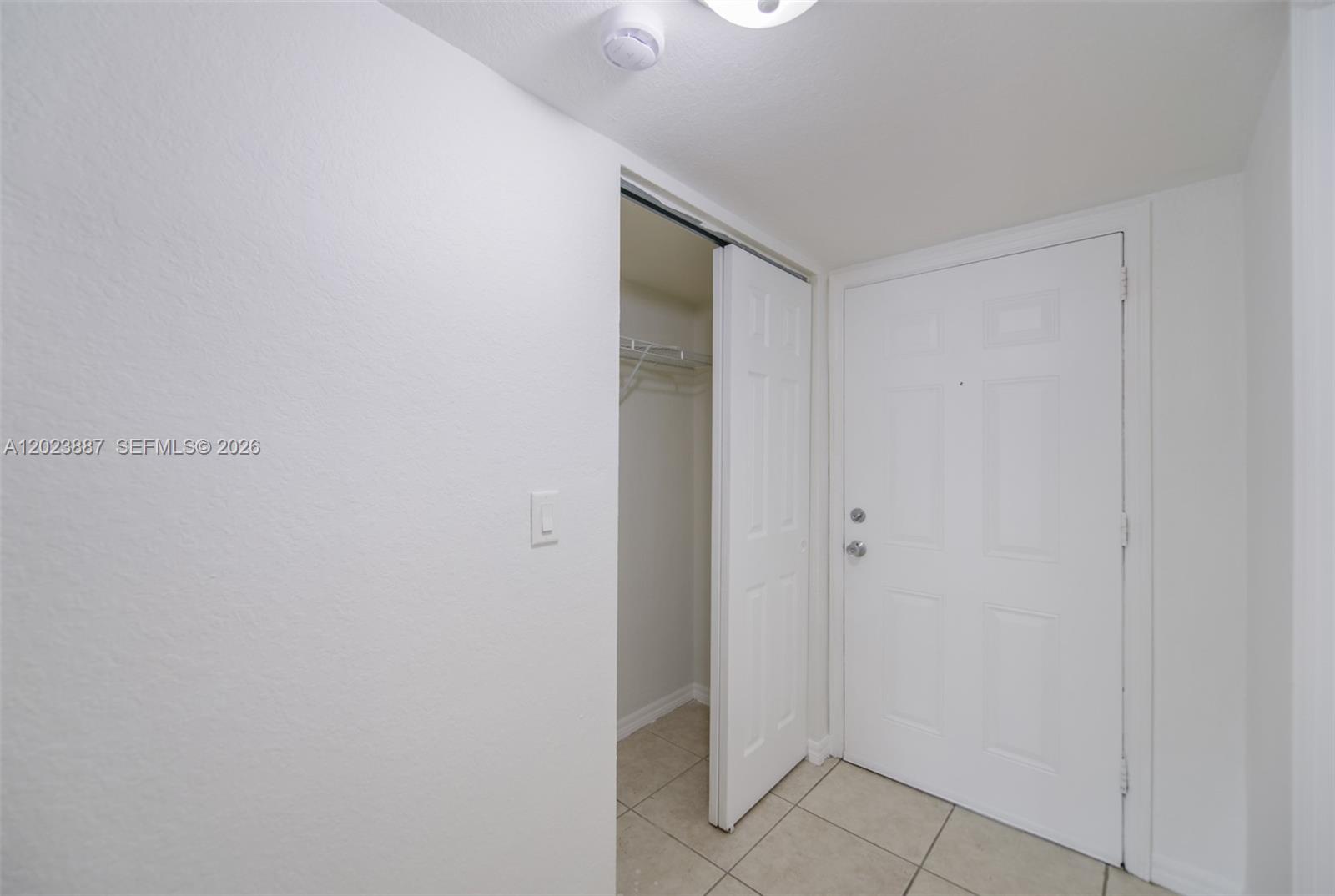 7737 Southwest 88th Street, Unit C312 Miami, FL 33156 - Photo 12 of 32 a view of an empty room