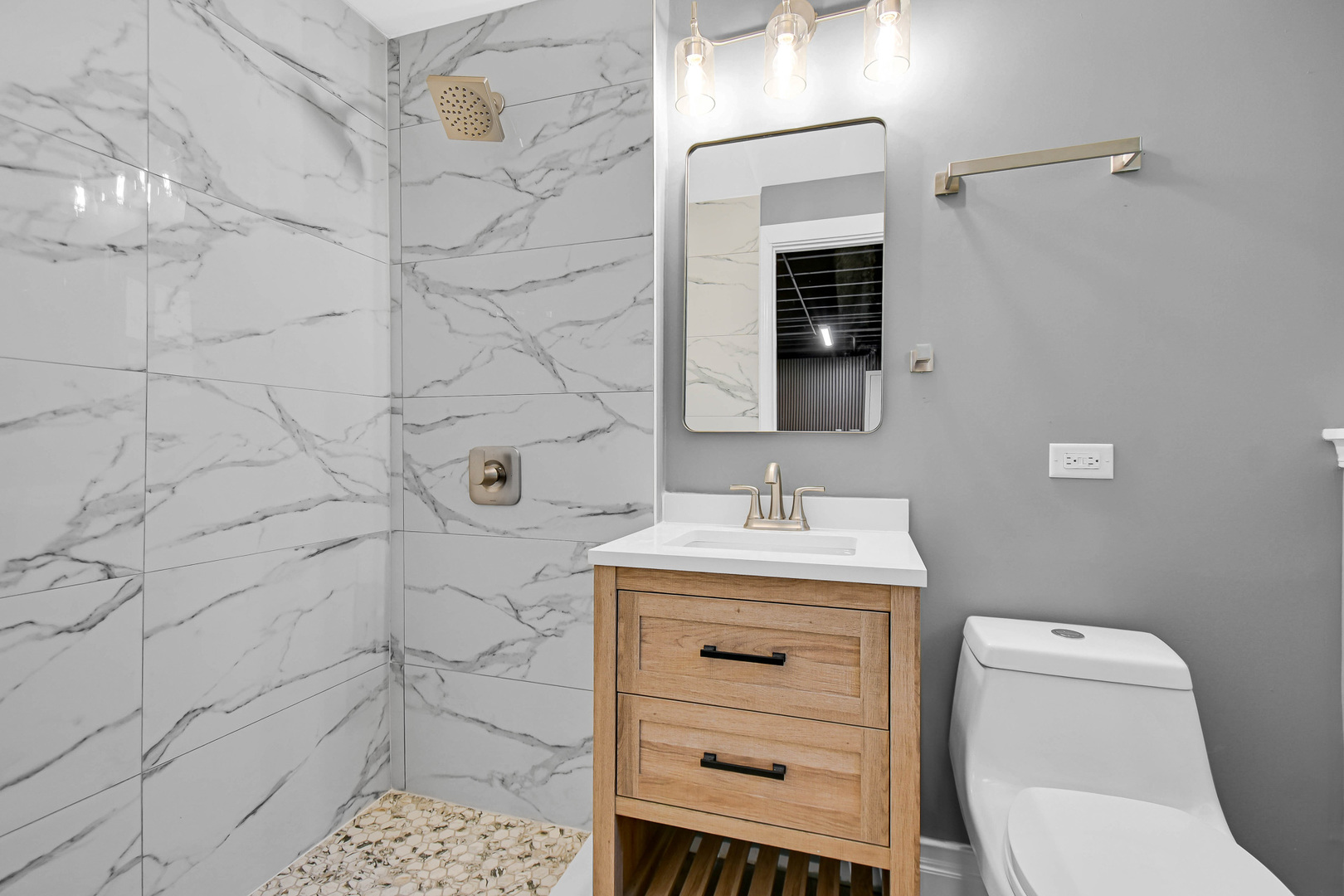 28W502 Leverenz Road Naperville, IL 60564 - Photo 22 of 30 a bathroom with a toilet sink vanity and granite