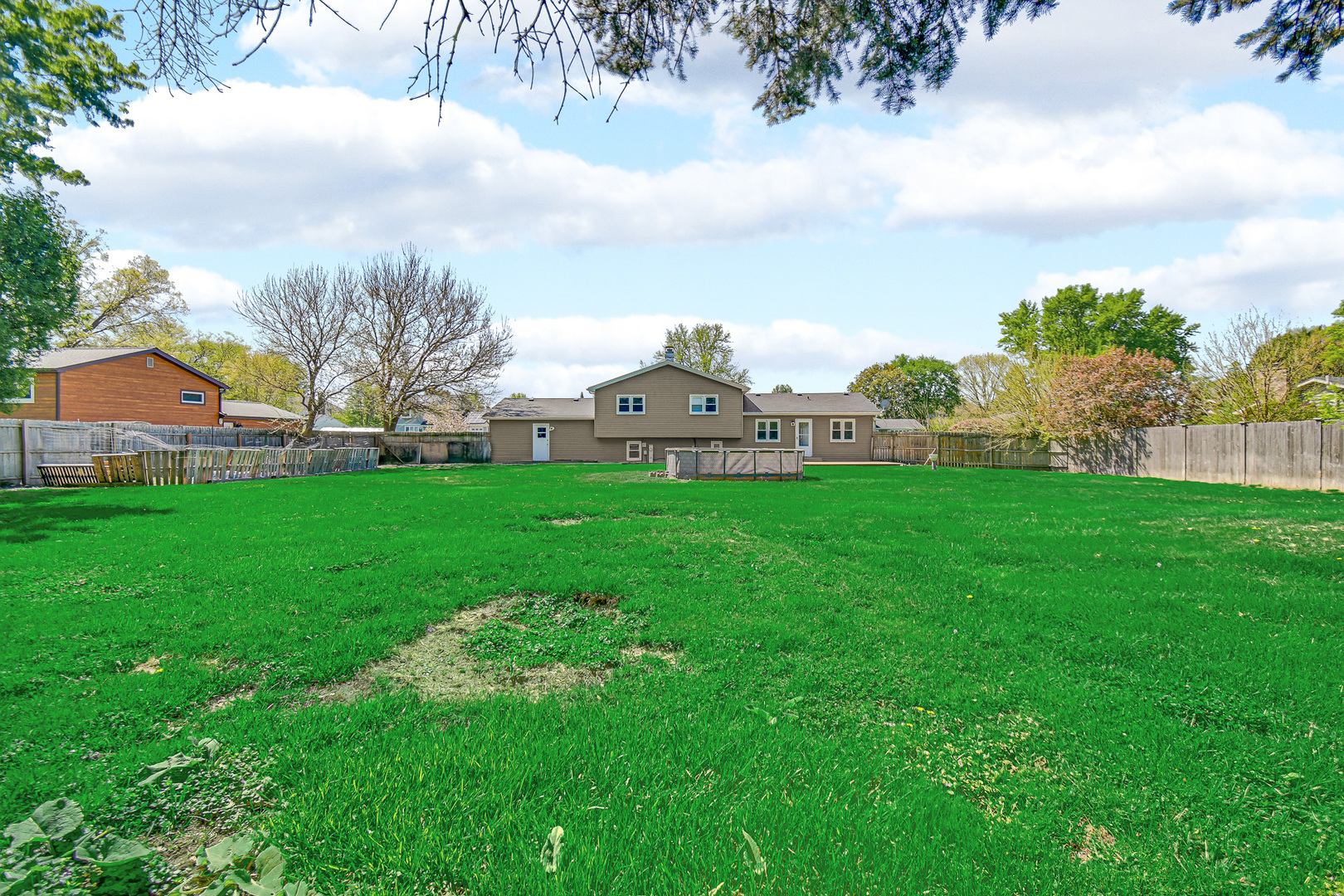28W502 Leverenz Road Naperville, IL 60564 - Photo 23 of 30 a view of a house with a big yard and large trees