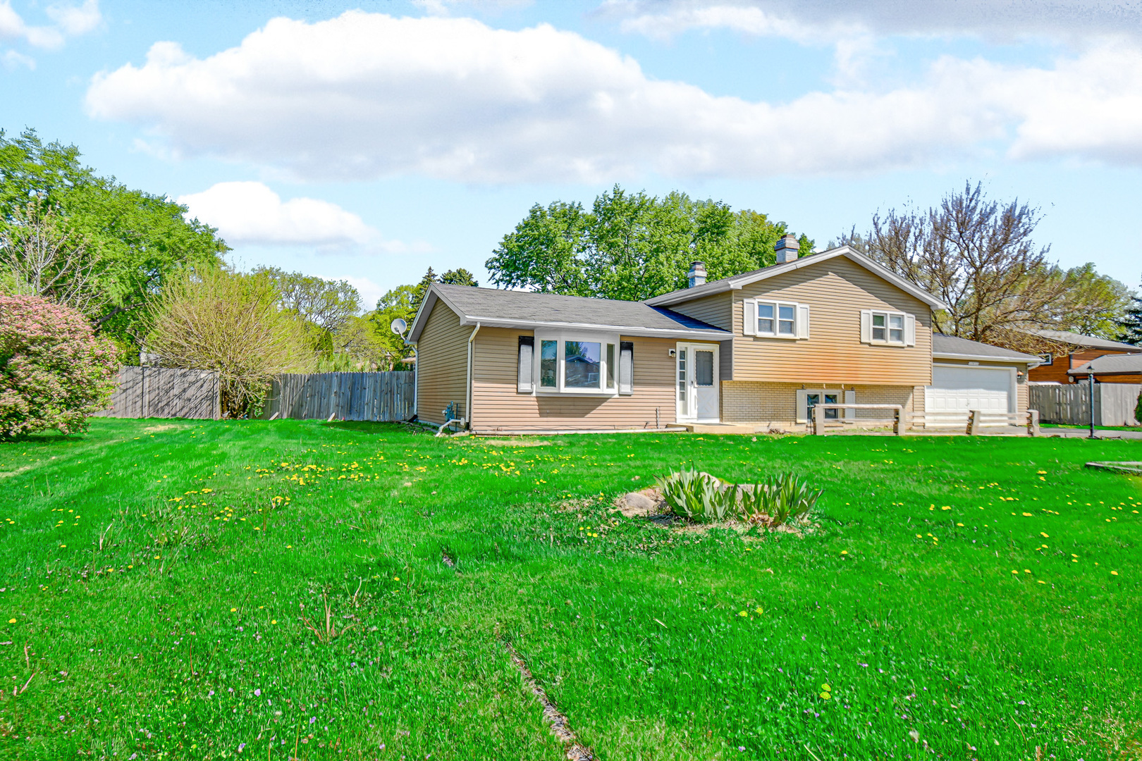 28W502 Leverenz Road Naperville, IL 60564 - Photo 24 of 30 a view of an house with backyard and garden