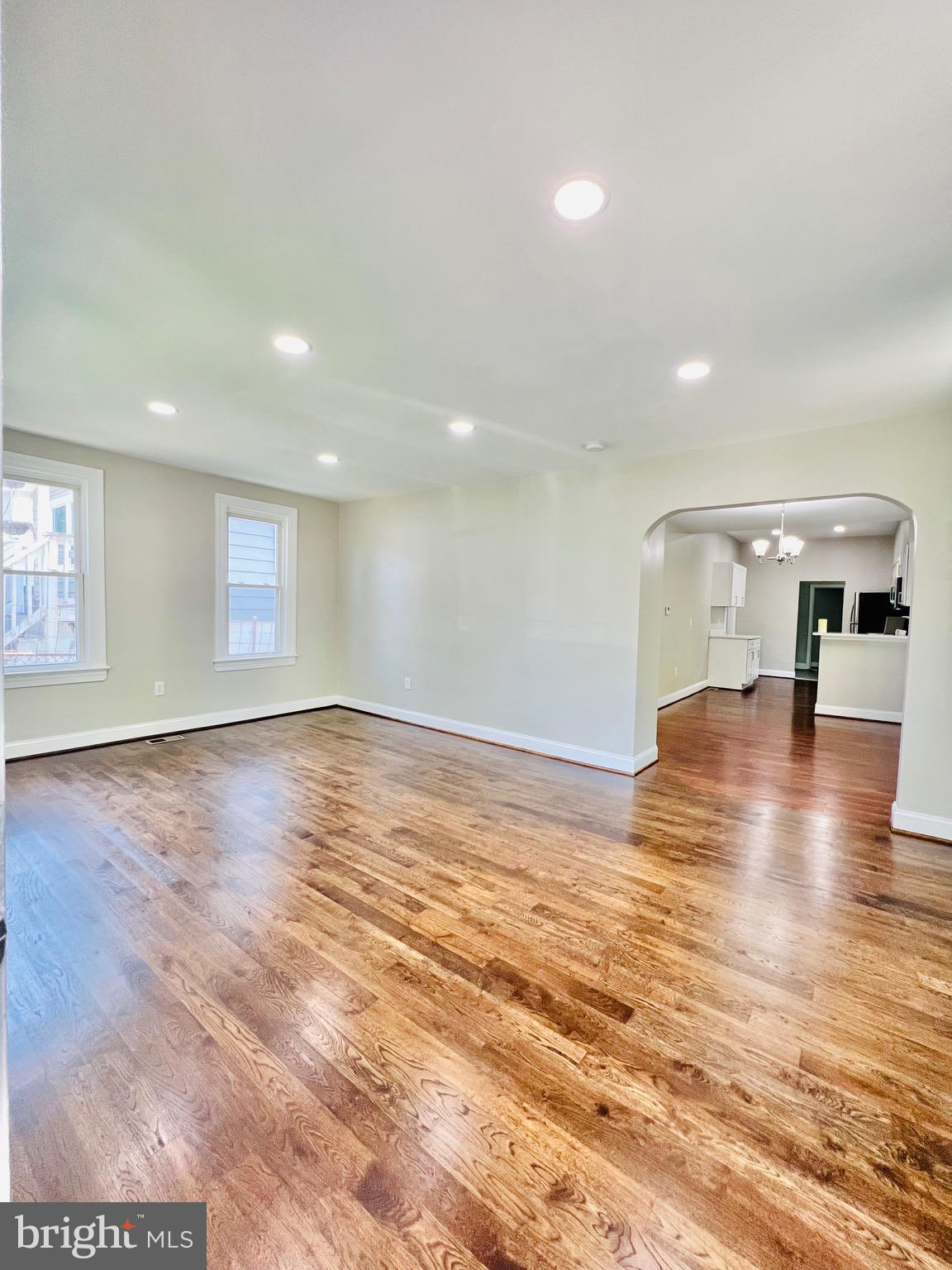 5709 Dade Street Capitol Heights, MD 20743 - Photo 4 of 23 a view of empty room with wooden floor