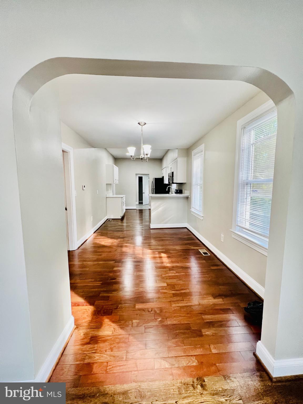 5709 Dade Street Capitol Heights, MD 20743 - Photo 9 of 23 a view of a kitchen with a sink and cabinets