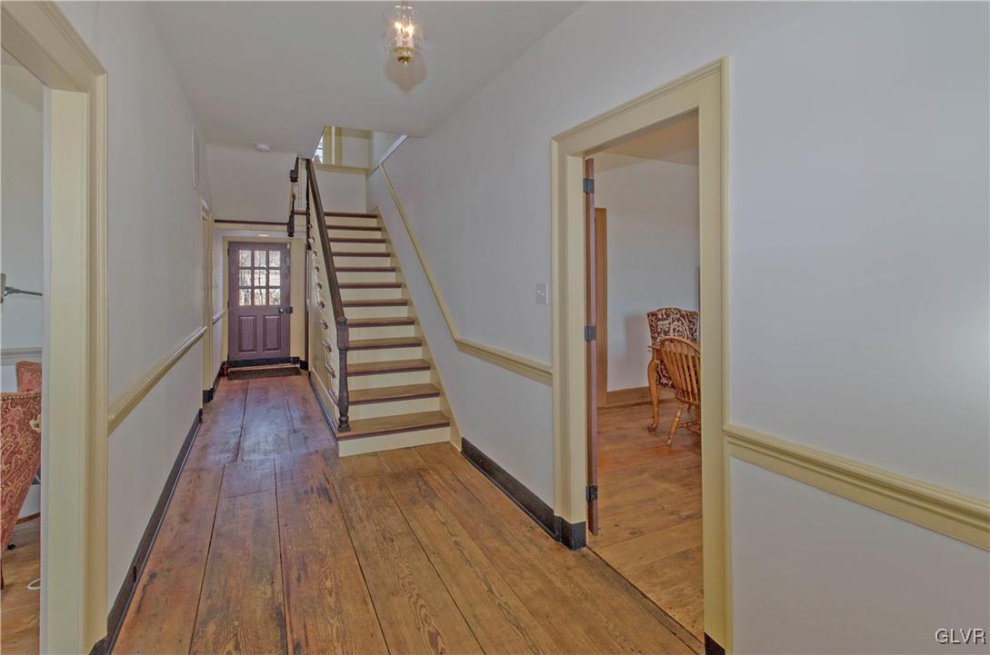 50 Durham Road Easton, PA 18042 - Photo 11 of 31 a view of a hallway with wooden floor and staircase