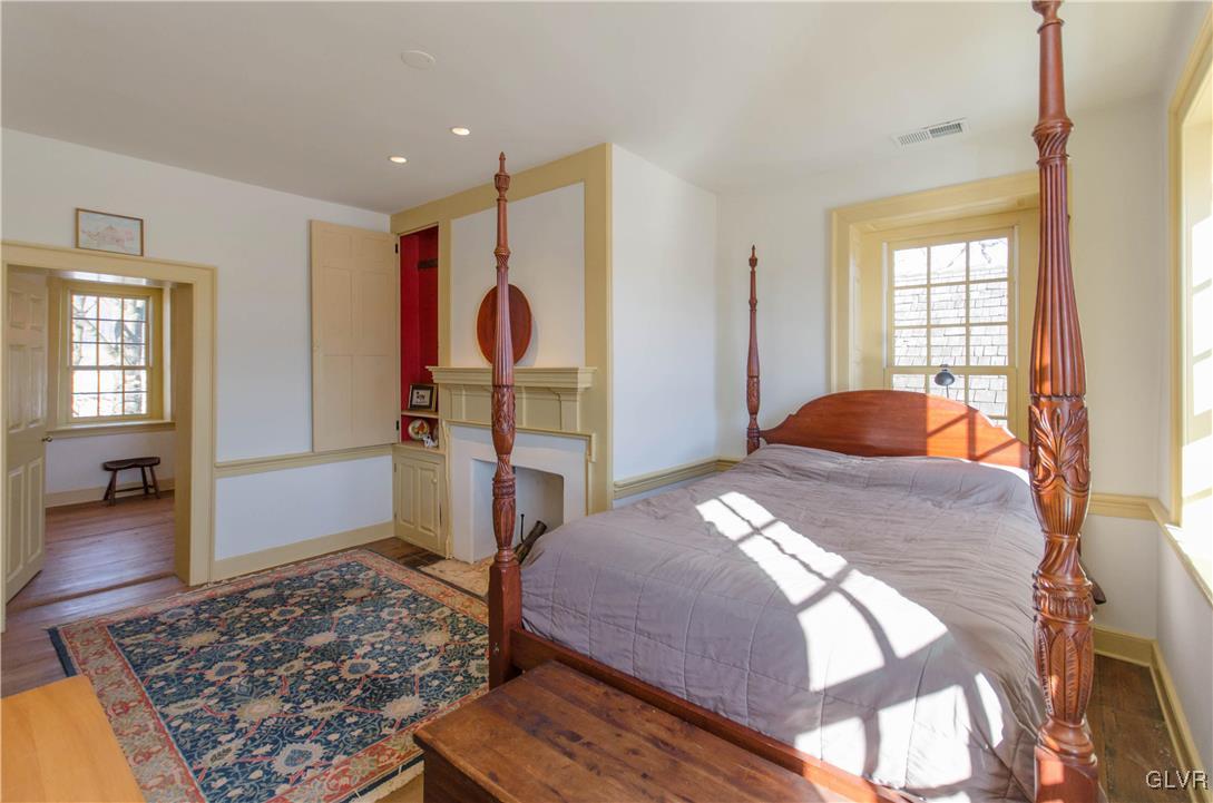 50 Durham Road Easton, PA 18042 - Photo 14 of 31 a bedroom with a bed and wooden floor