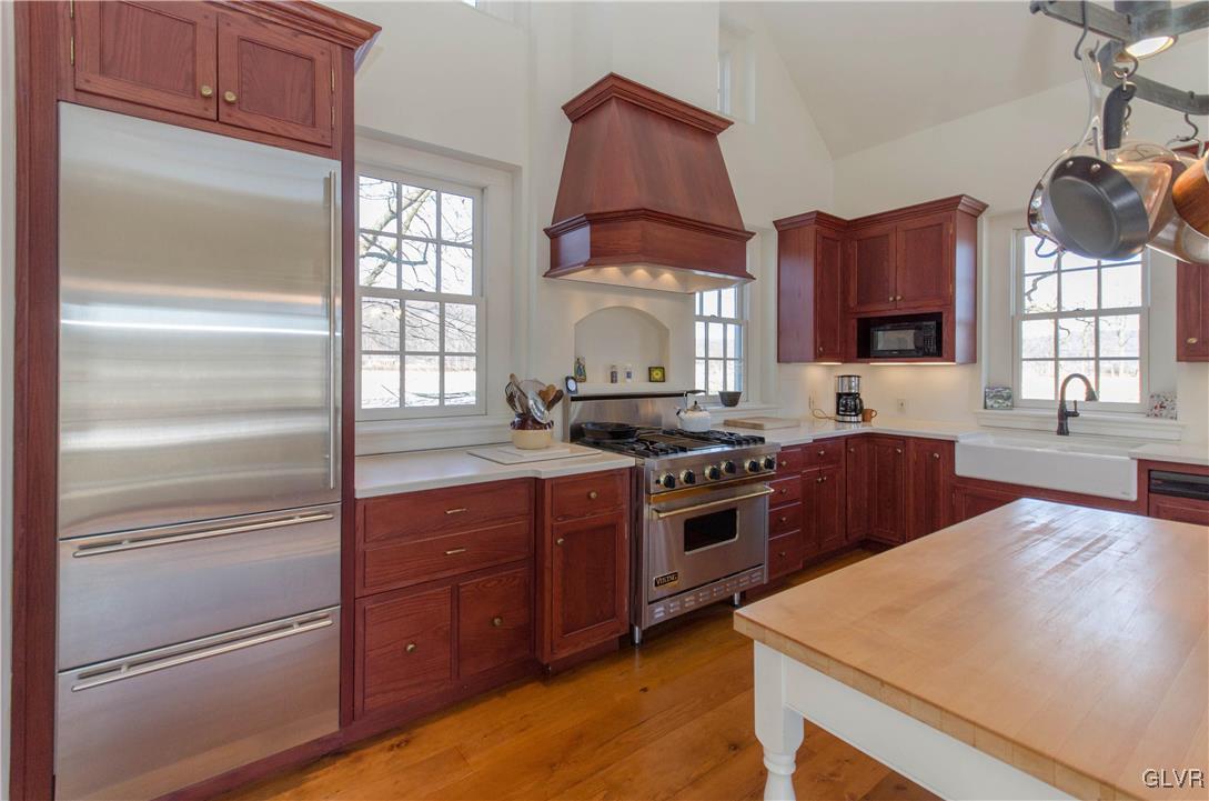 50 Durham Road Easton, PA 18042 - Photo 7 of 31 a kitchen with stainless steel appliances granite countertop a stove a sink and a refrigerator