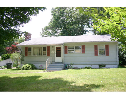 400 Commonwealth Avenue Springfield, MA 01108 - Photo 1 of 2 a front view of a house with a yard