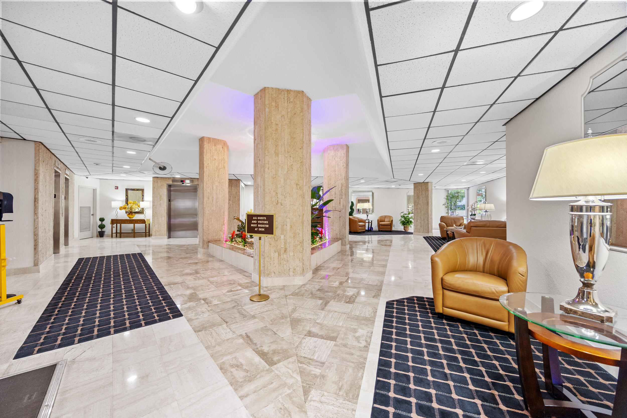 10777 West Sample Road, Unit 508 Coral Springs, FL 33065 - Photo 3 of 25 a living room with furniture