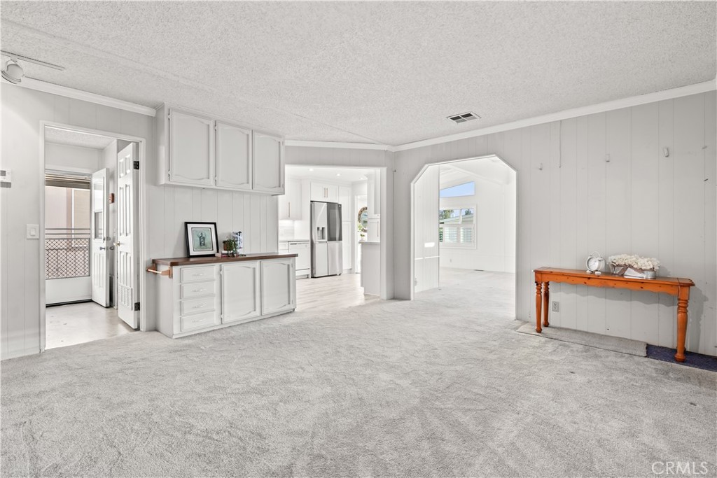 5200 Irvine Boulevard Irvine, CA 92620 - Photo 16 of 52 a view of a kitchen with refrigerator and windows