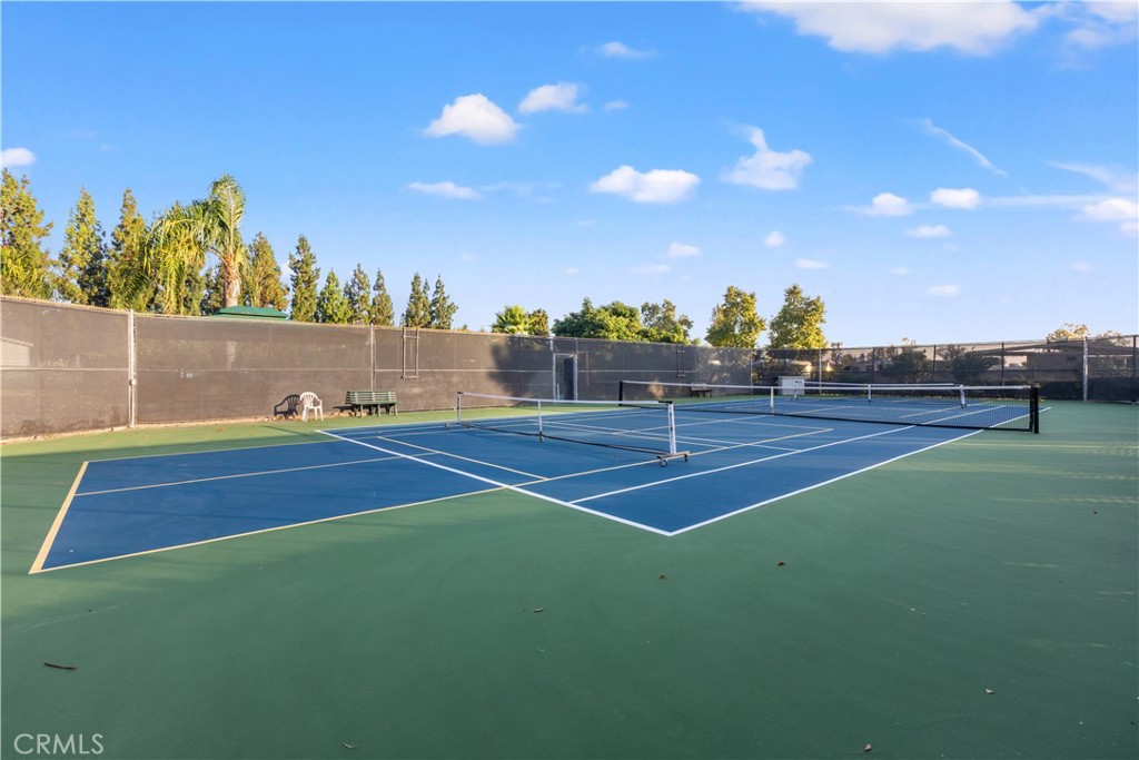 5200 Irvine Boulevard Irvine, CA 92620 - Photo 41 of 52 a view of outdoor space and tennis court